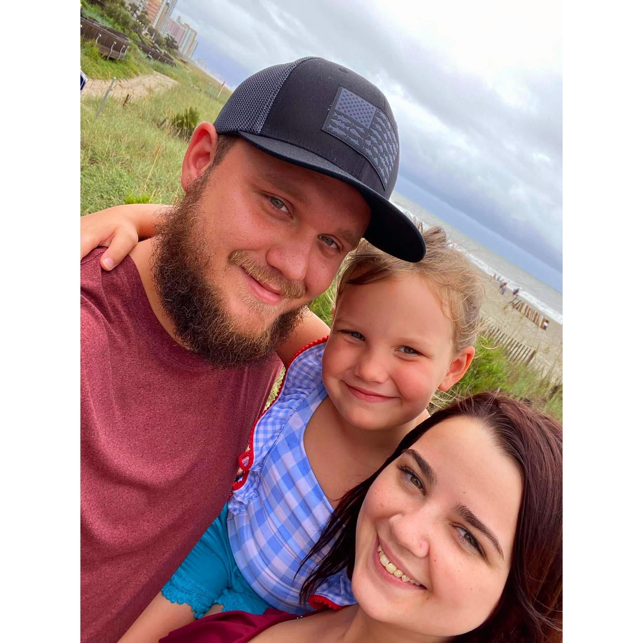 Our first family vacation. Myrtle Beach, SC 
Pregnant with our little bean we lost.