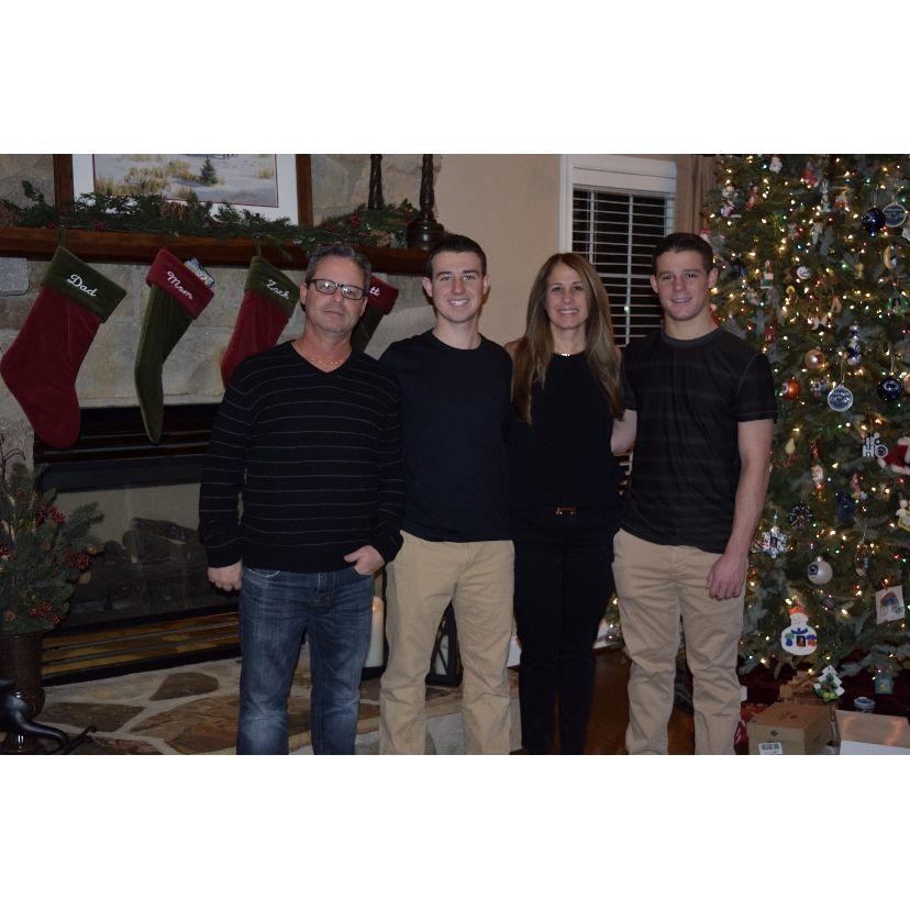 Zack, his brother, and his parents.