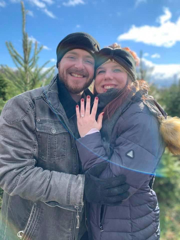 Sam proposed during our annual trip to the tree farm. It was a perfect addition to a very beloved tradition!