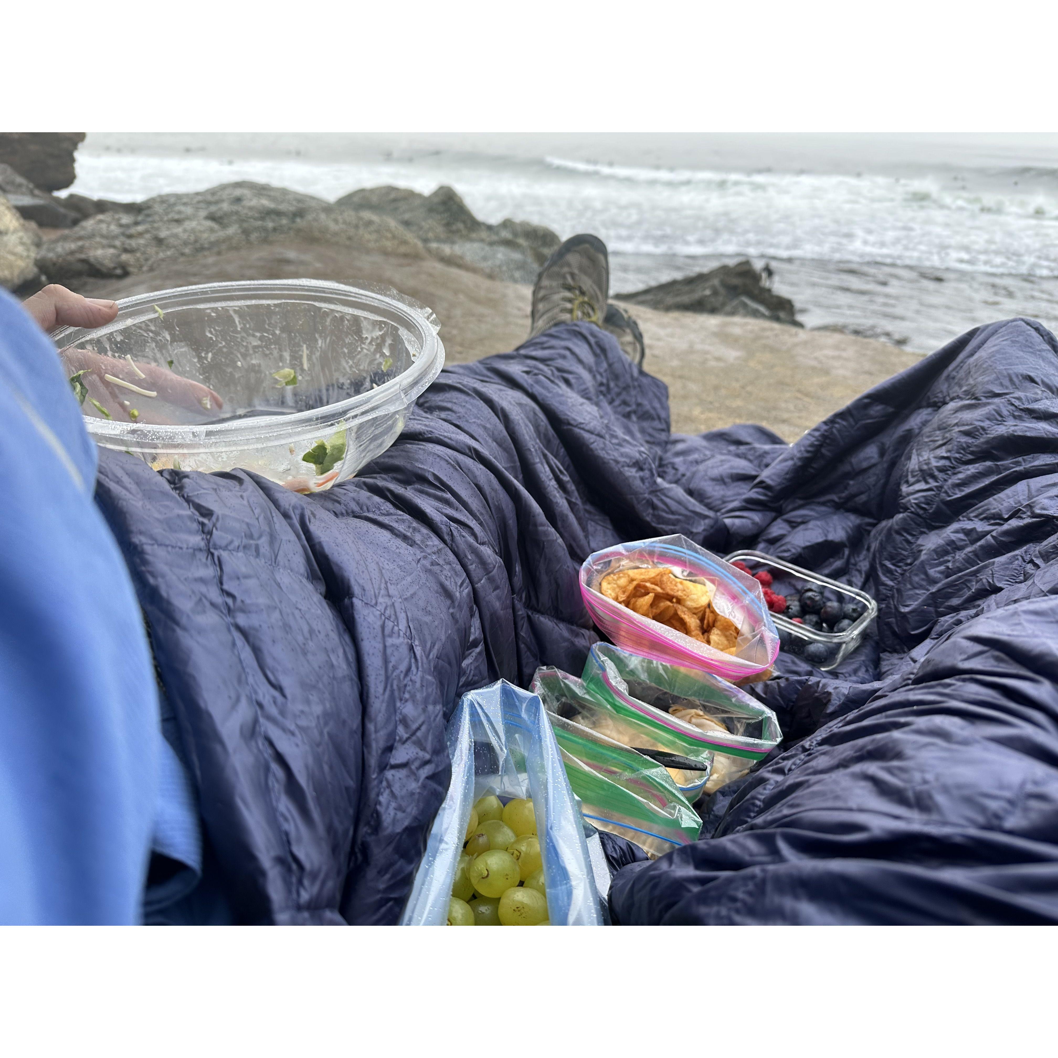 2nd Date - beach picnic in the rain ... front row seating to God's majestic creation ... Dinner & a Show!