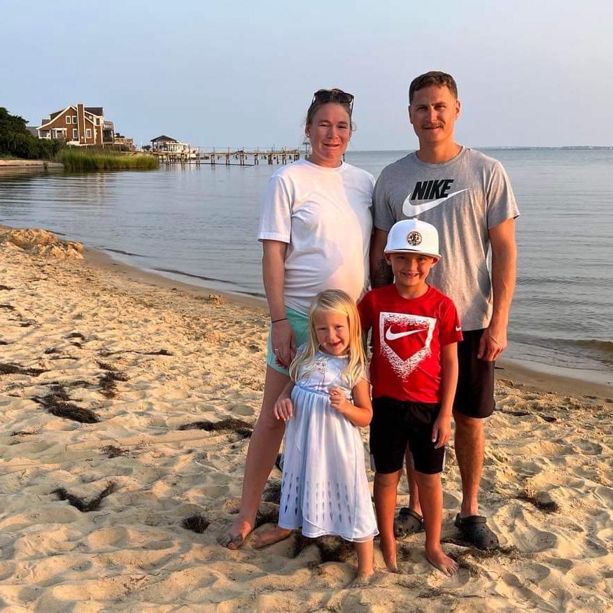 Last beach vacation as a family of 4