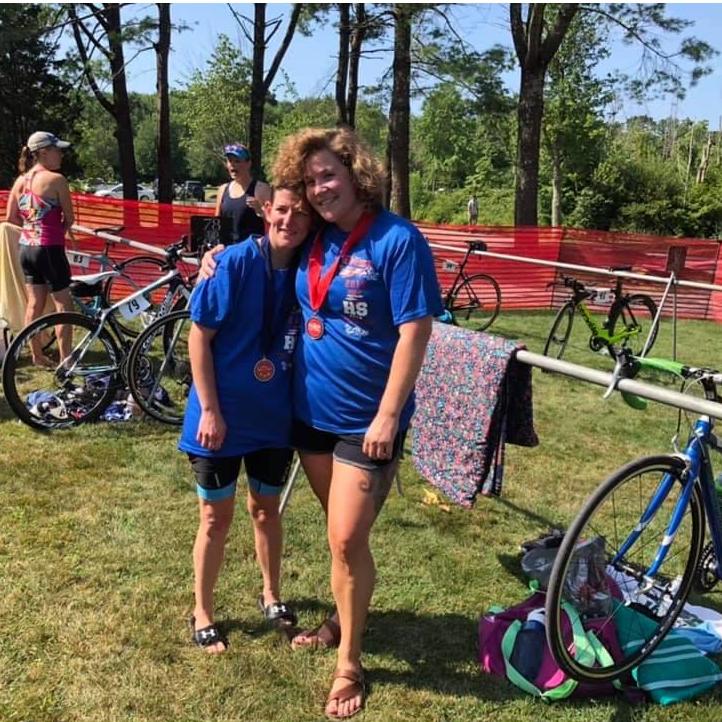 Tired, sweaty and happy to finish the Tri-Lincoln together this past August.