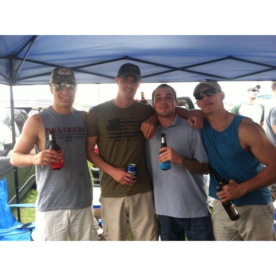 Willson, Ricky, Davenport, and Huffman (from left to right) at the Nascar race 2015