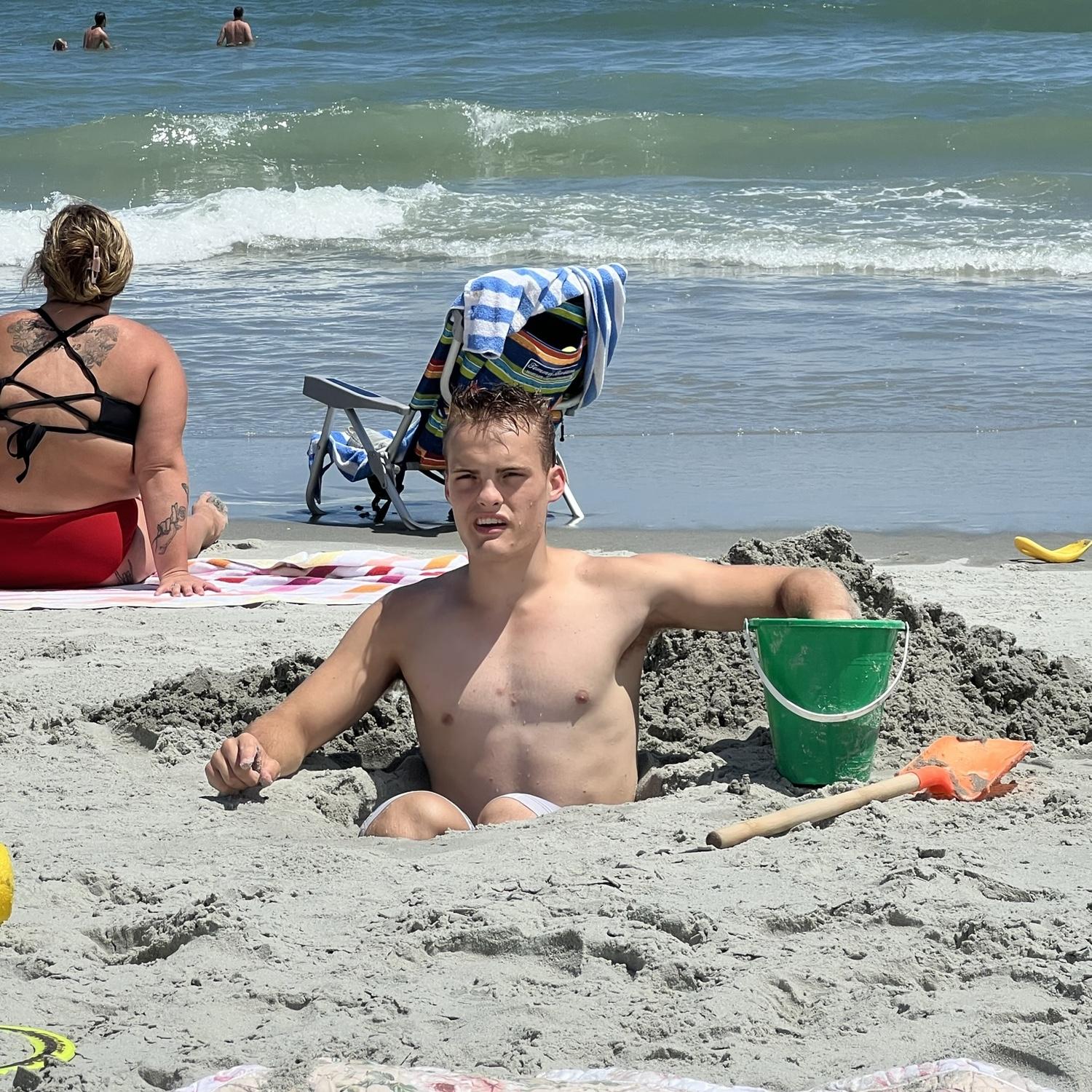 When you forget your beach chair, you dig one