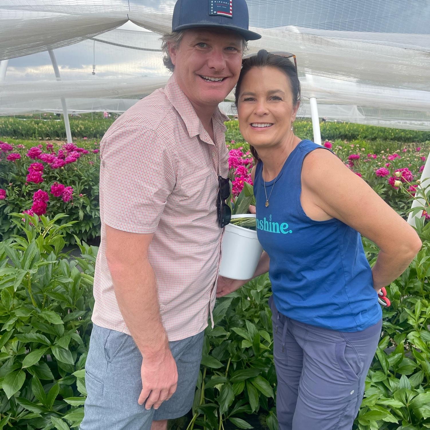 Justin taking Kim to a peony farm in Colorado with Justin's parents that are in town to visit.