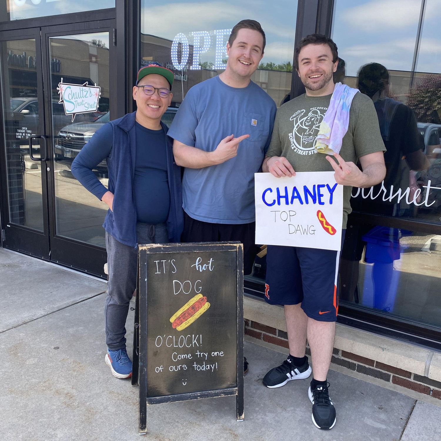 Mike places second in our local hot dog eating contest in June 2025. Pictured with his co-residents (Desmond and Clayton) who were his biggest supporters! π
