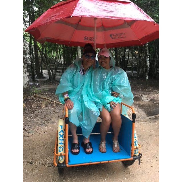 Yes, bike taxis are a thing, and you sit in the FRONT! Riding back to the meeting spot after hiking the 120 steep steps of Tulum in the middle of a major thunderstorm!