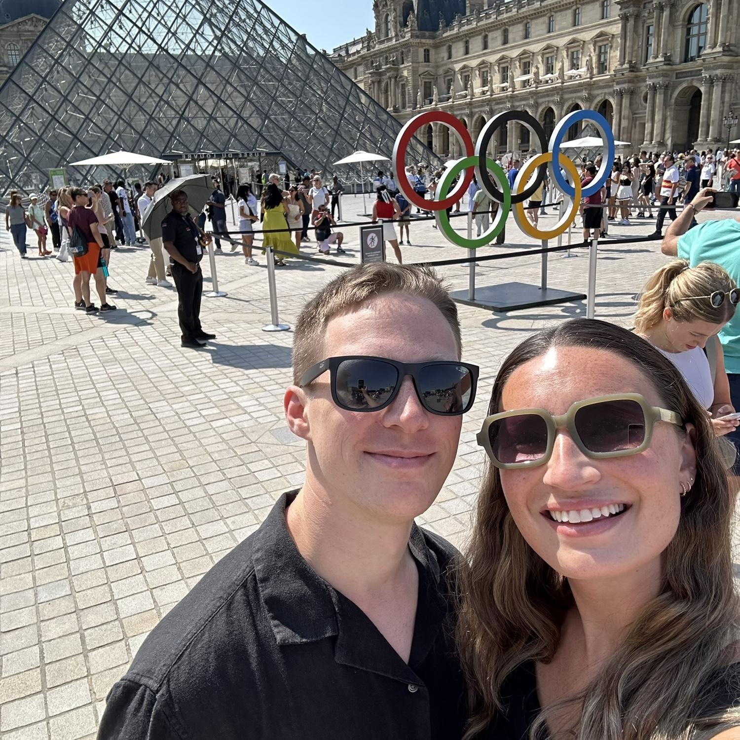 O & K checking out the Olympic rings in front of the Louvre