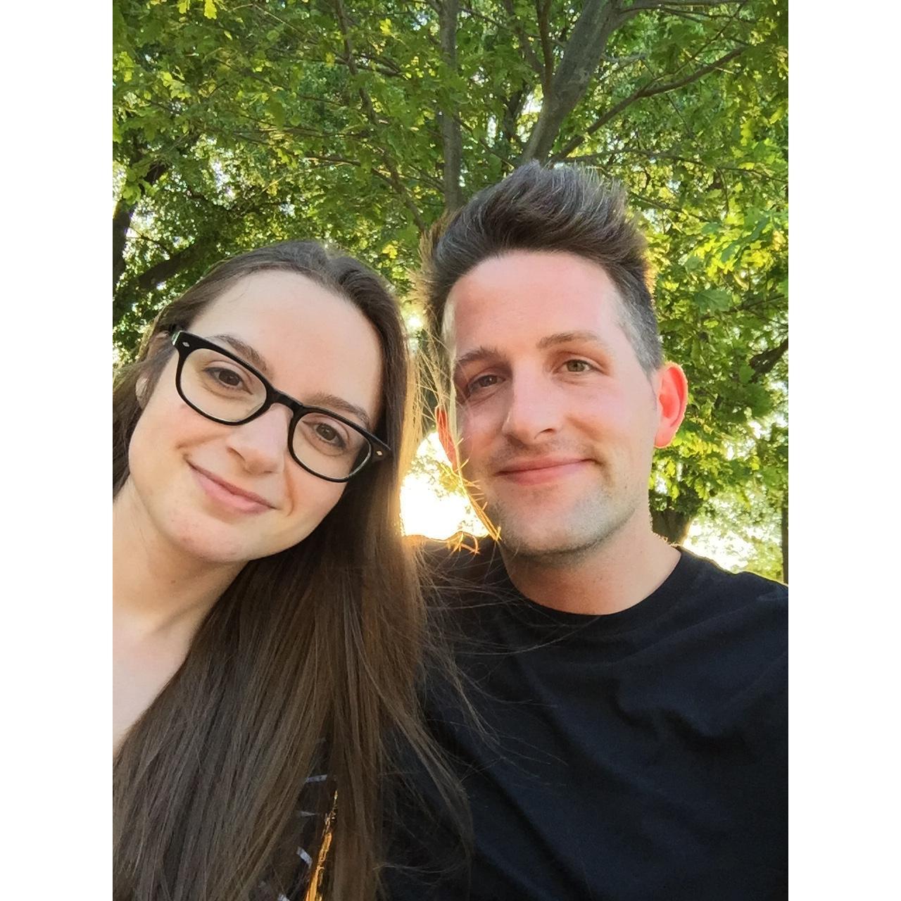 Pretending to be models under a tree.