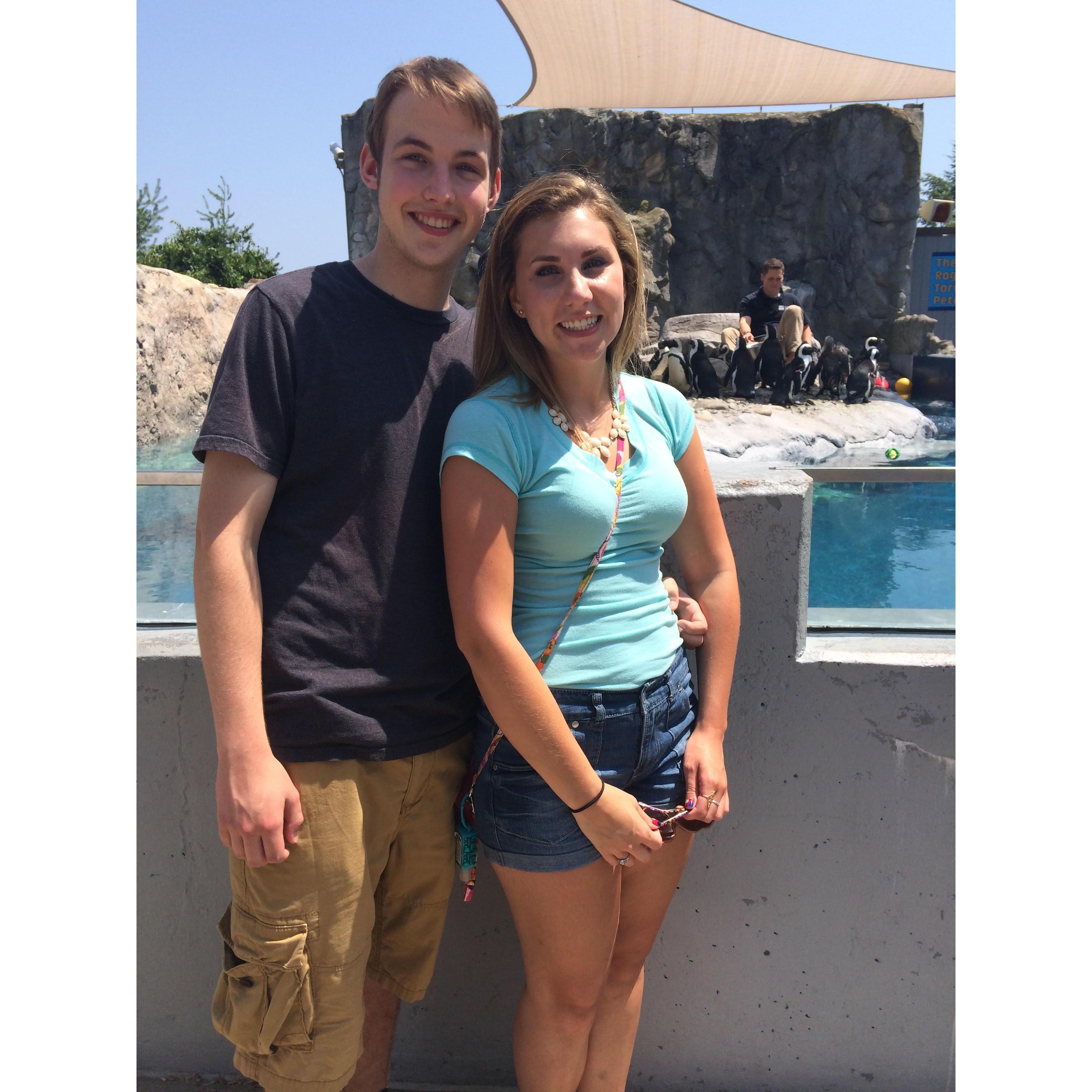 Our first picture together as an "official" couple at Mystic Aquarium on July 2nd, 2014