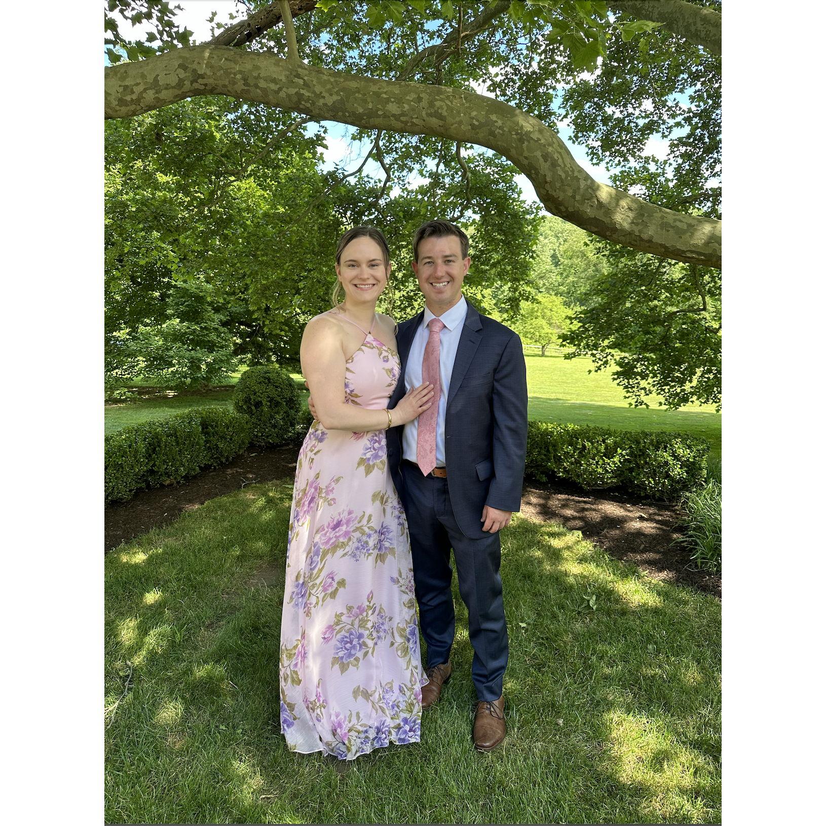 Sarah and Zack celebrating at a friend's wedding.