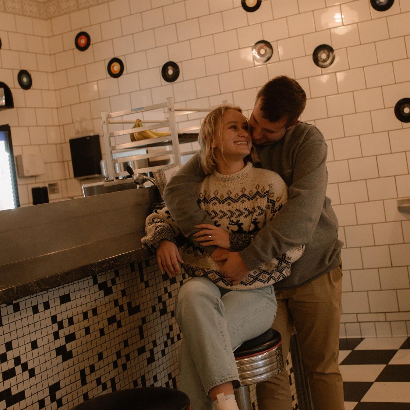 Engagement photos at our official first date. House of Flavors in Ludington