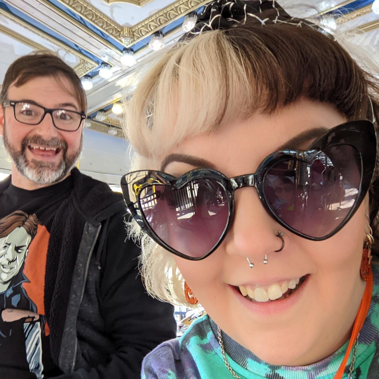 He's so happy because we're on a carousel. You can't see it but I promise we're on a carousel. And he's really happy.