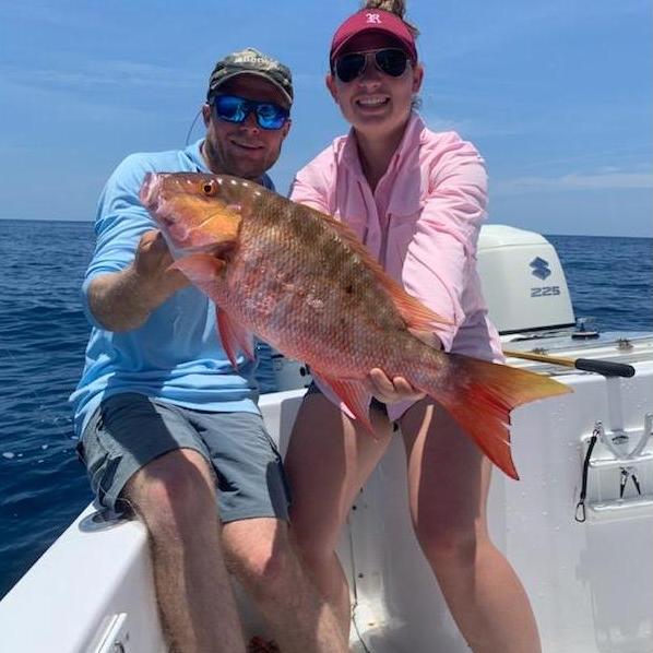 A beautiful Mutton Snapper on display, this was my first time offshore fishing!