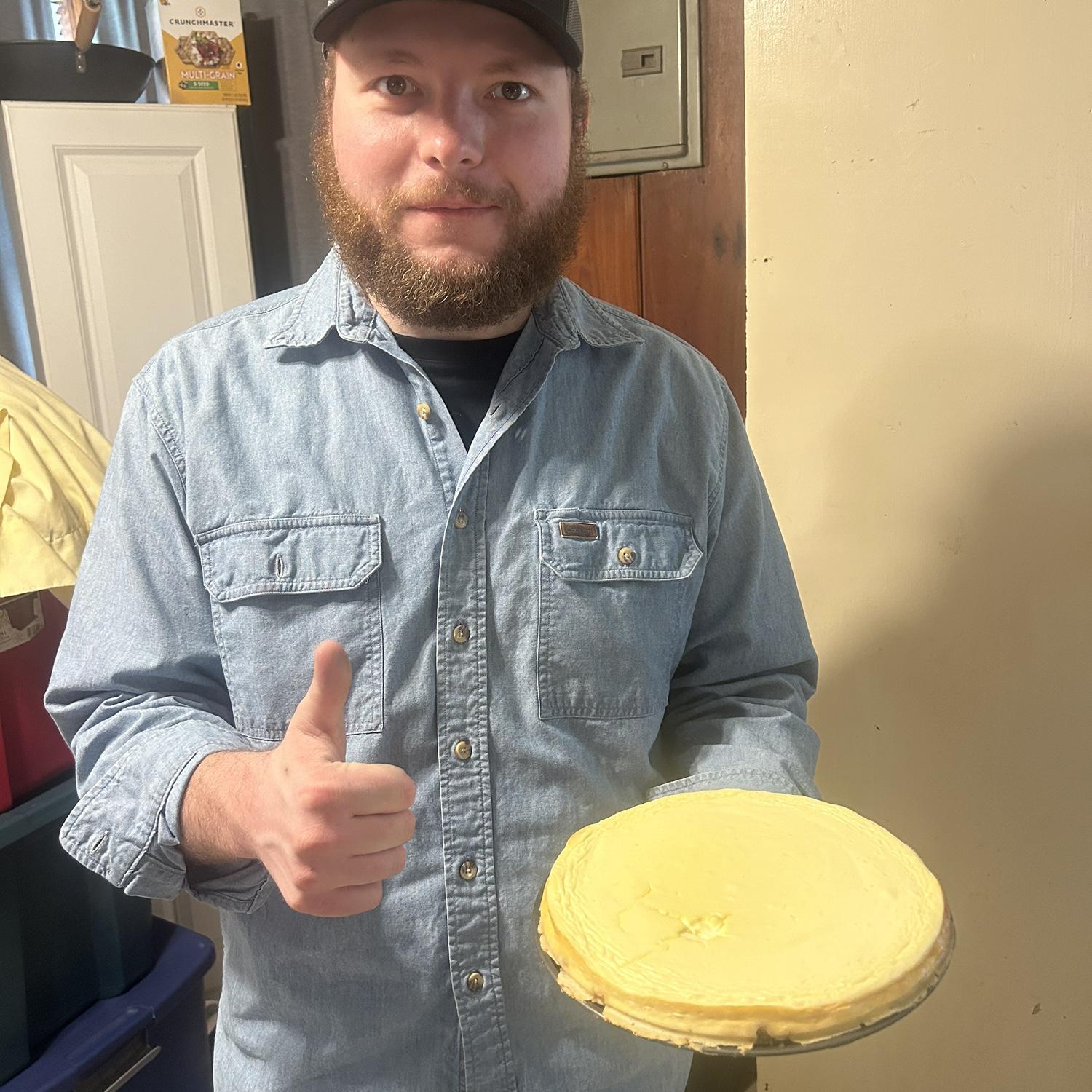 Anna-Lisa surprised Larry with a cheesecake when he moved to Louisiana