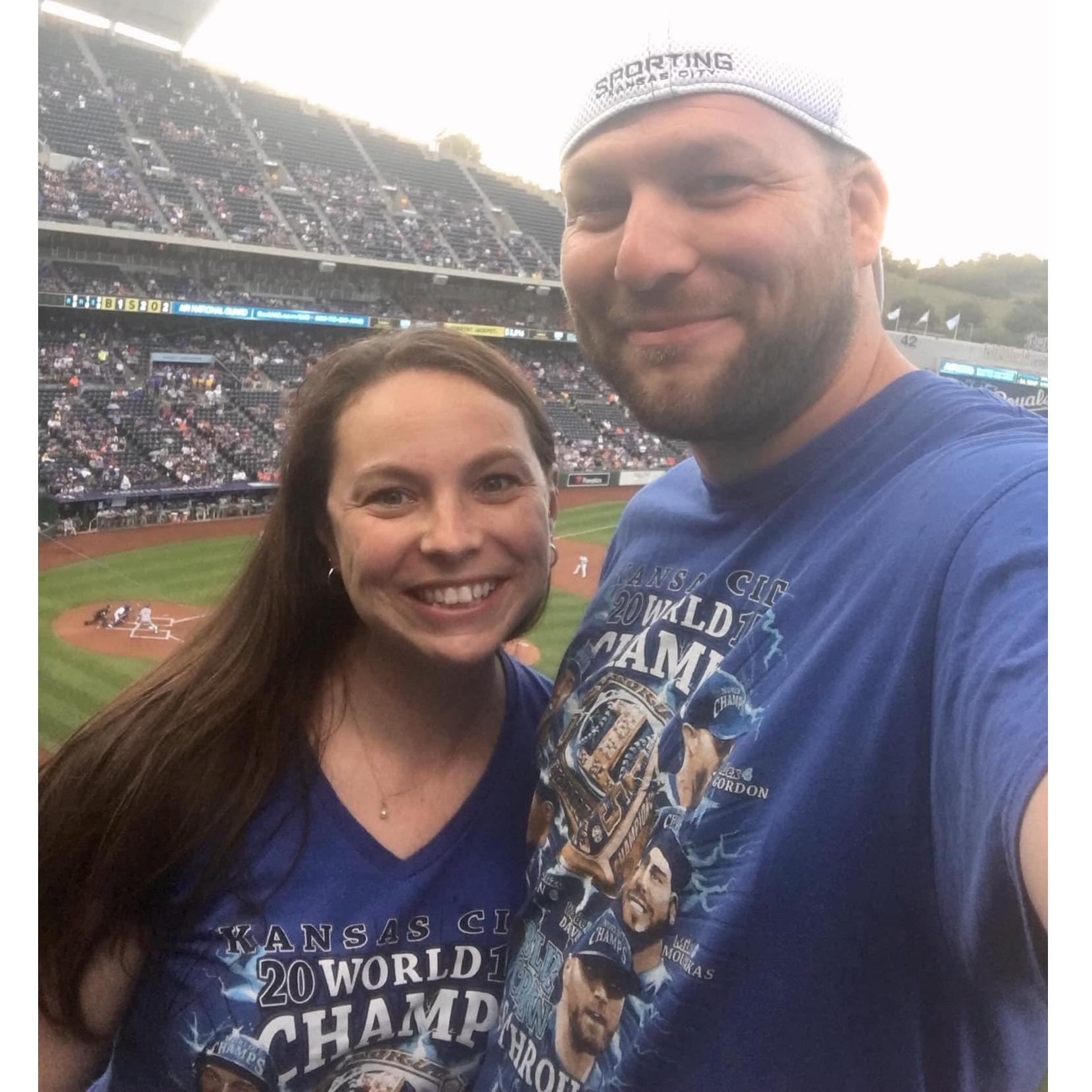 Amy and Patrick love going to sporting events. At this Royals baseball game, they wore matching shirts that they had purchased before they'd even met.