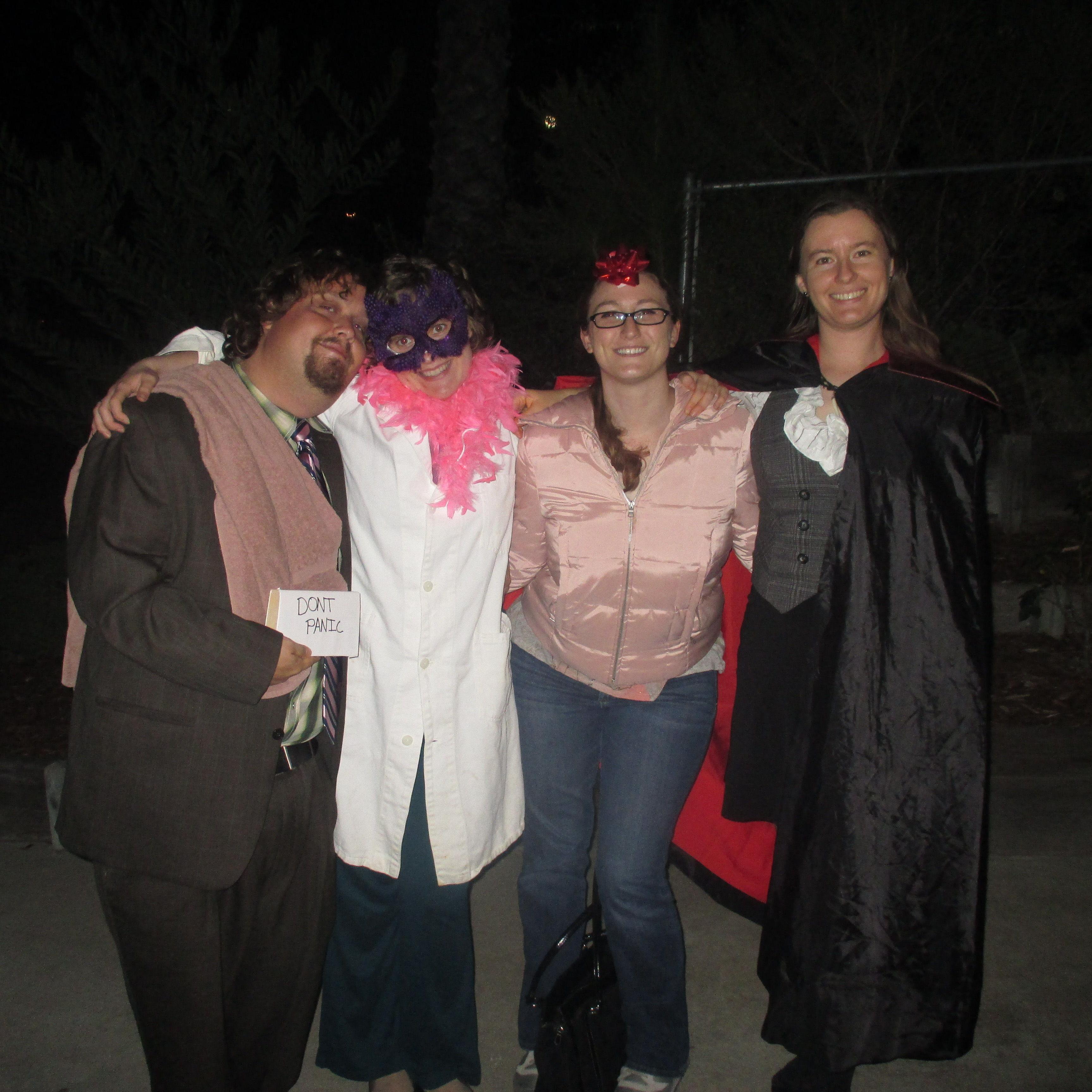 Our first Halloween! With Anne as "present", Christina as Dr. Who, Brian as Ford Prefect, and Erin as a Vampire.
