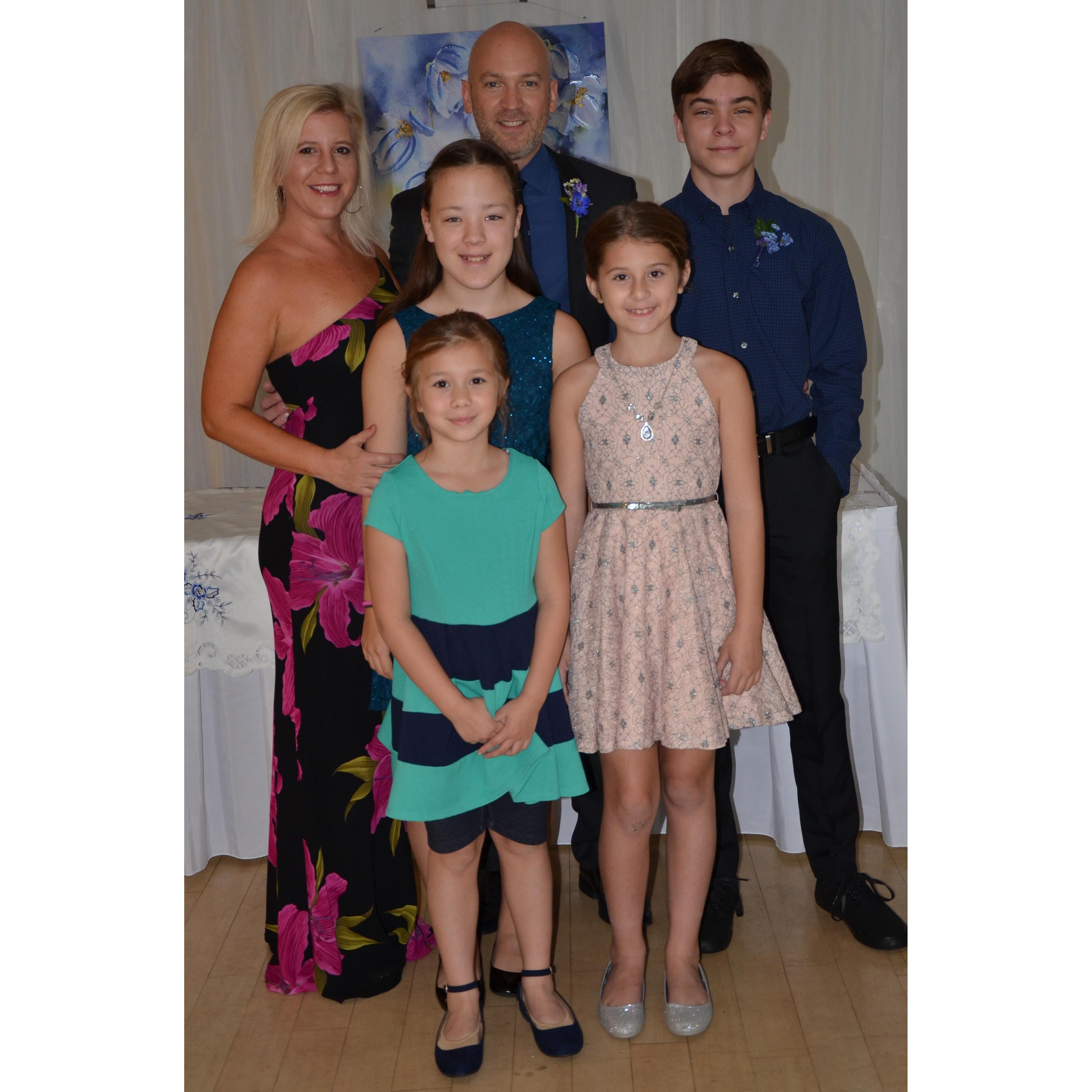 Our Brady Bunch. (Back row: Jen, Gary, Zach; Middle row: Kyra, Quinn; Front: Madi)