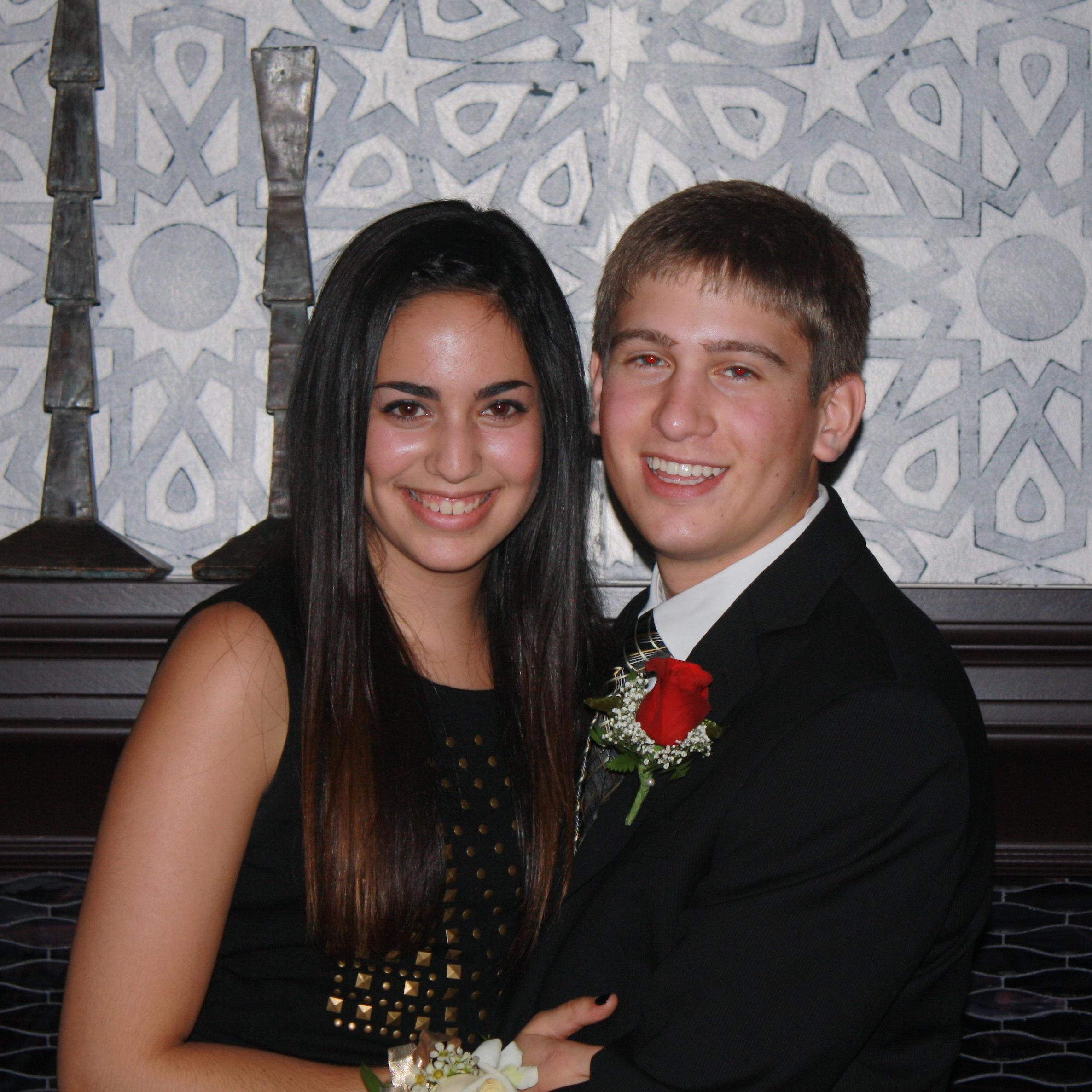 Our first (of many) high school homecoming dances together. We were too shy to coordinate our corsage/boutounniere as you can see...