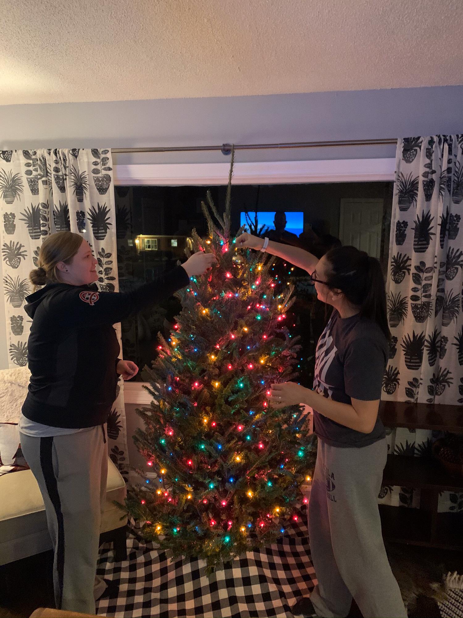 Decorating our first Christmas tree!!!