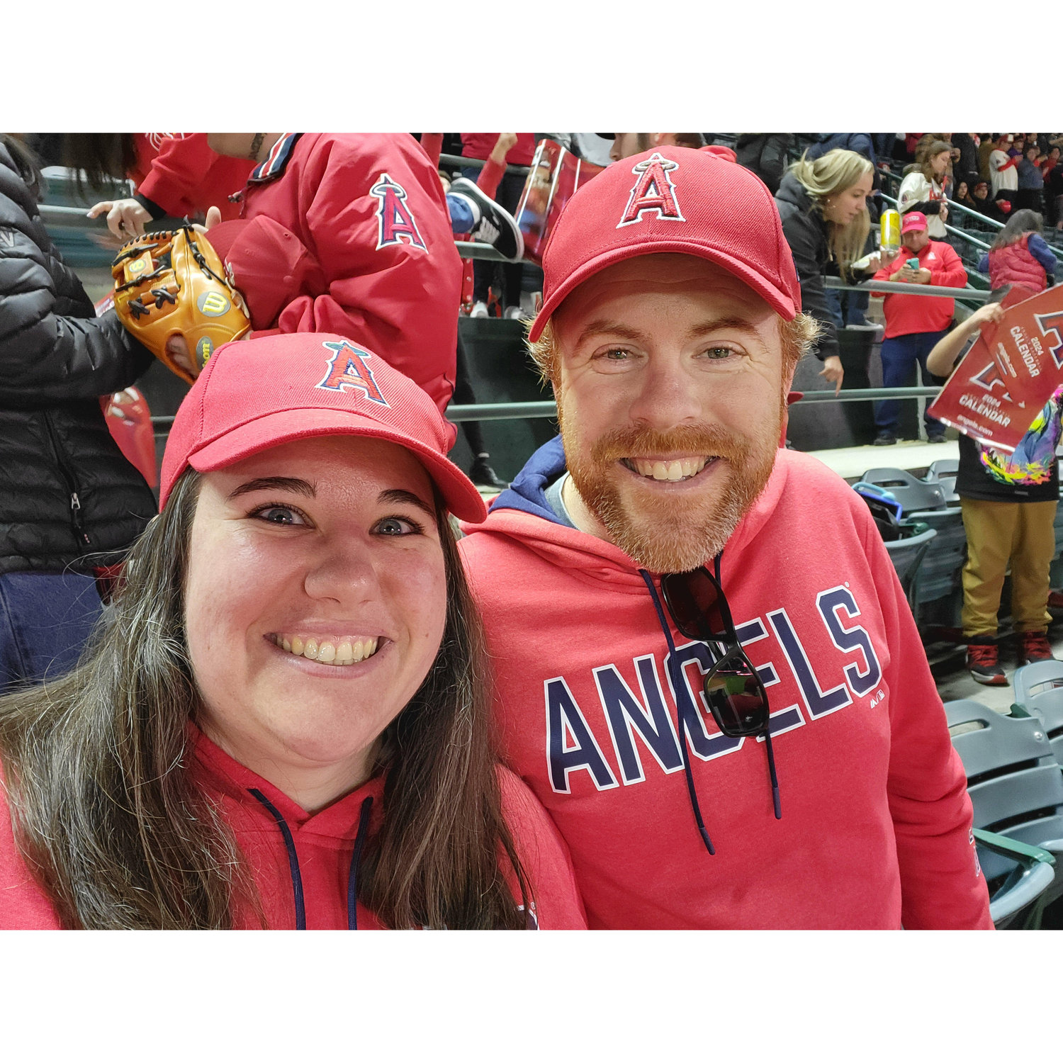 Angels game with matching sweatshirts