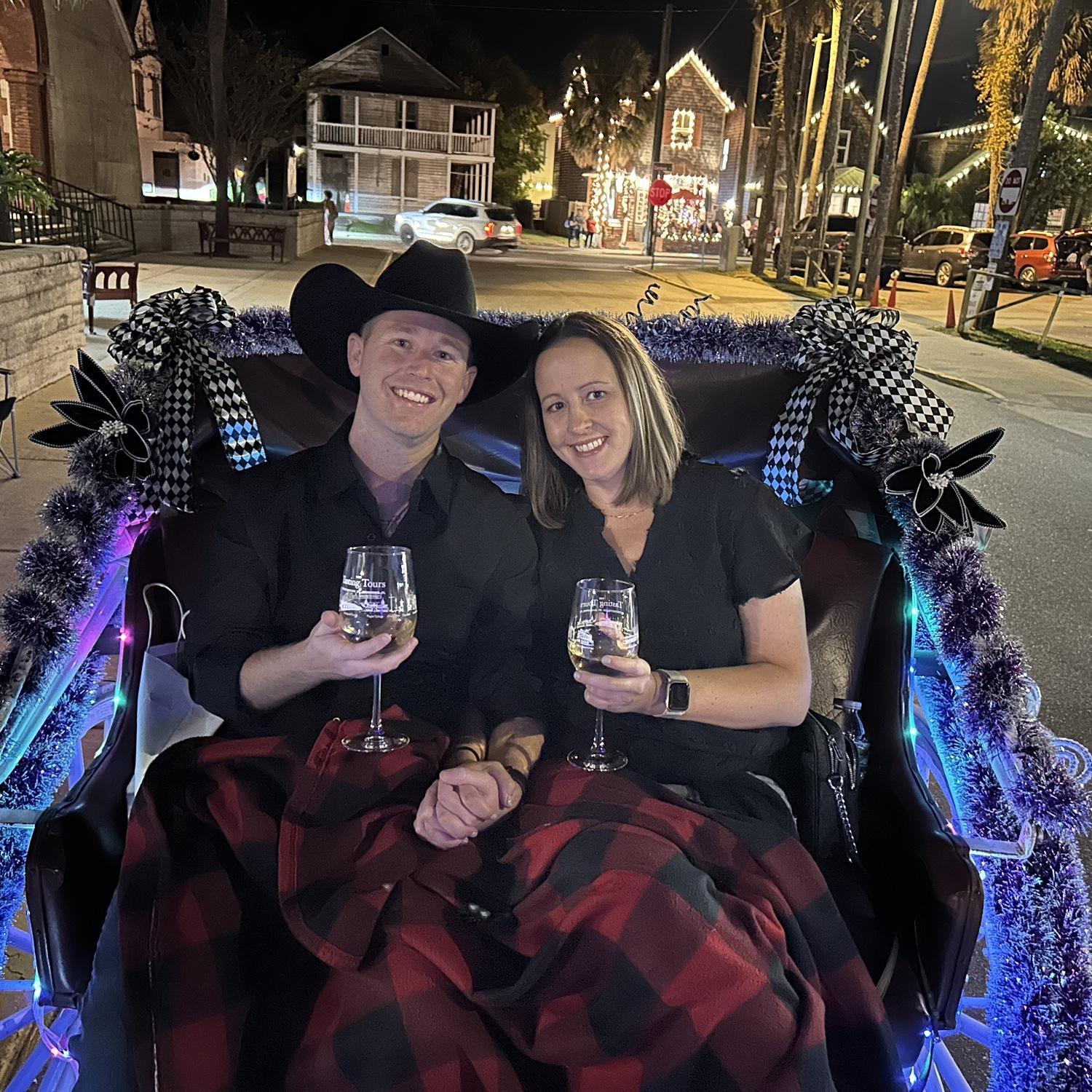 Brandon swept Tiana away with a horse drawn carriage ride under the romantic night of lights in St. Augustine!