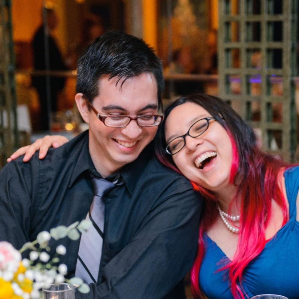 Wedding photos of us, from someone else's wedding in 2018.