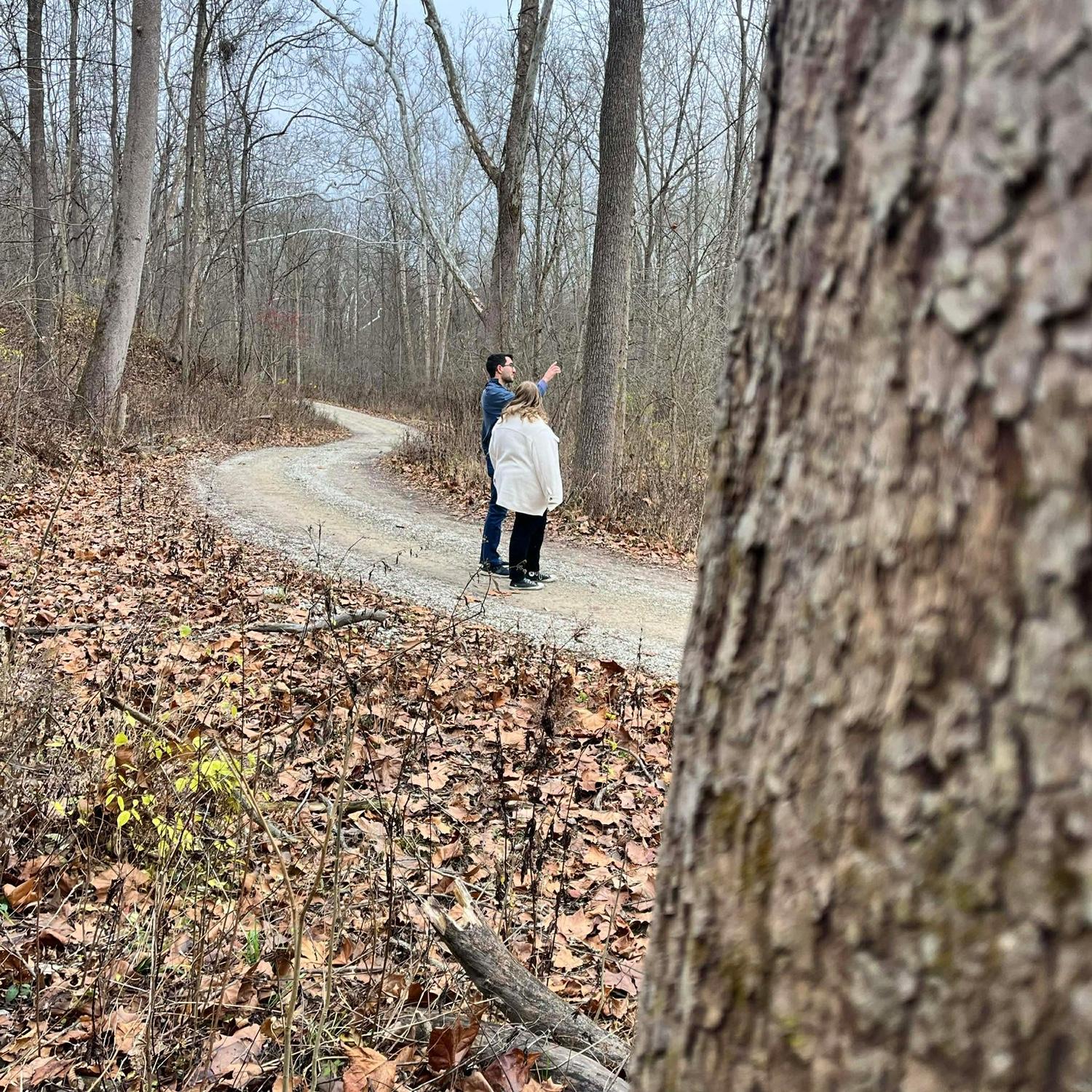 In Jonathan-fashion, he distracted Emma by turning her attention to a bush in the distance to look for a bird (in reality, the bird sound was coming from a Bluetooth speaker hidden in the bush).