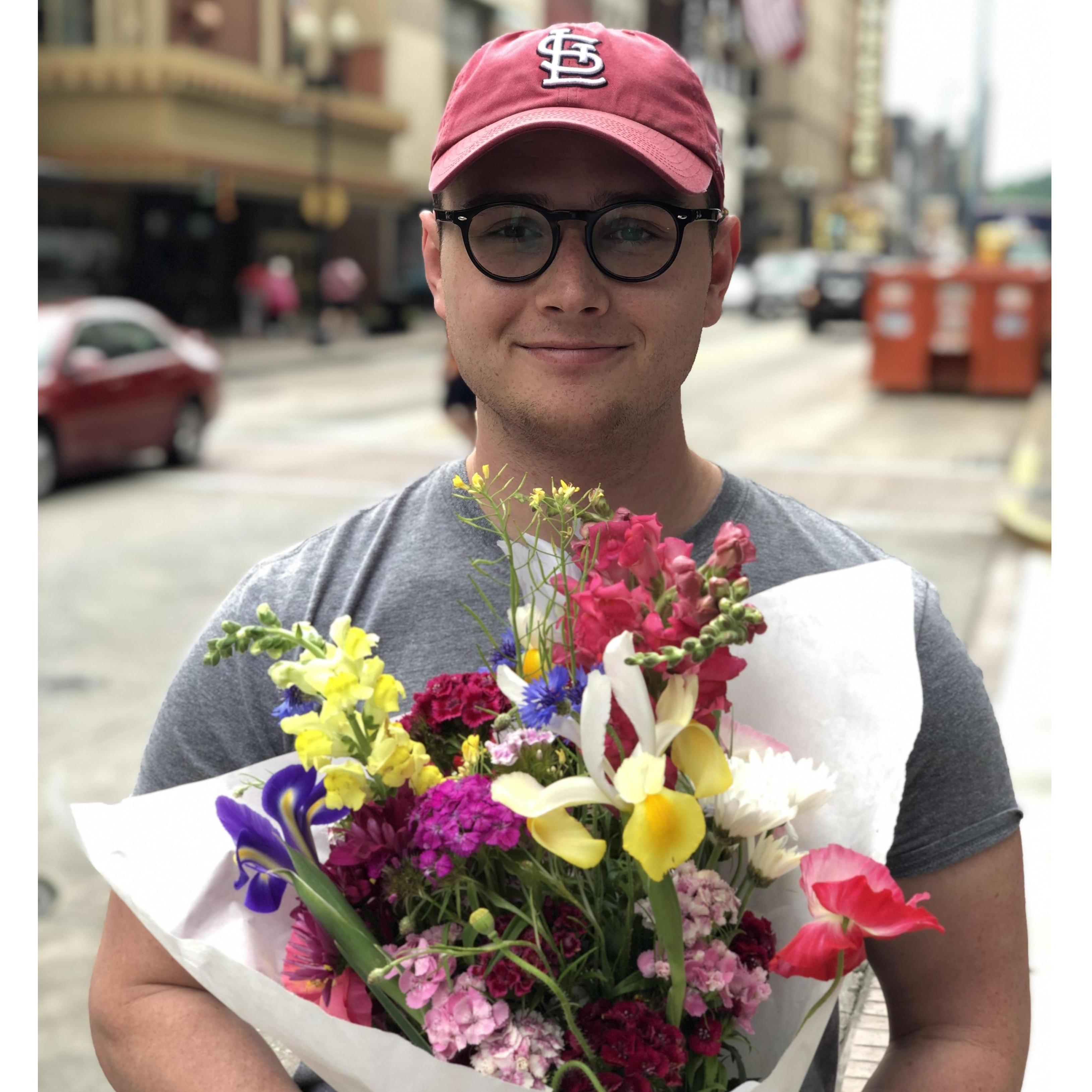 Grant bought flowers for Julia at the Knoxville farmer's market just before they moved back home - what a sweet boy!