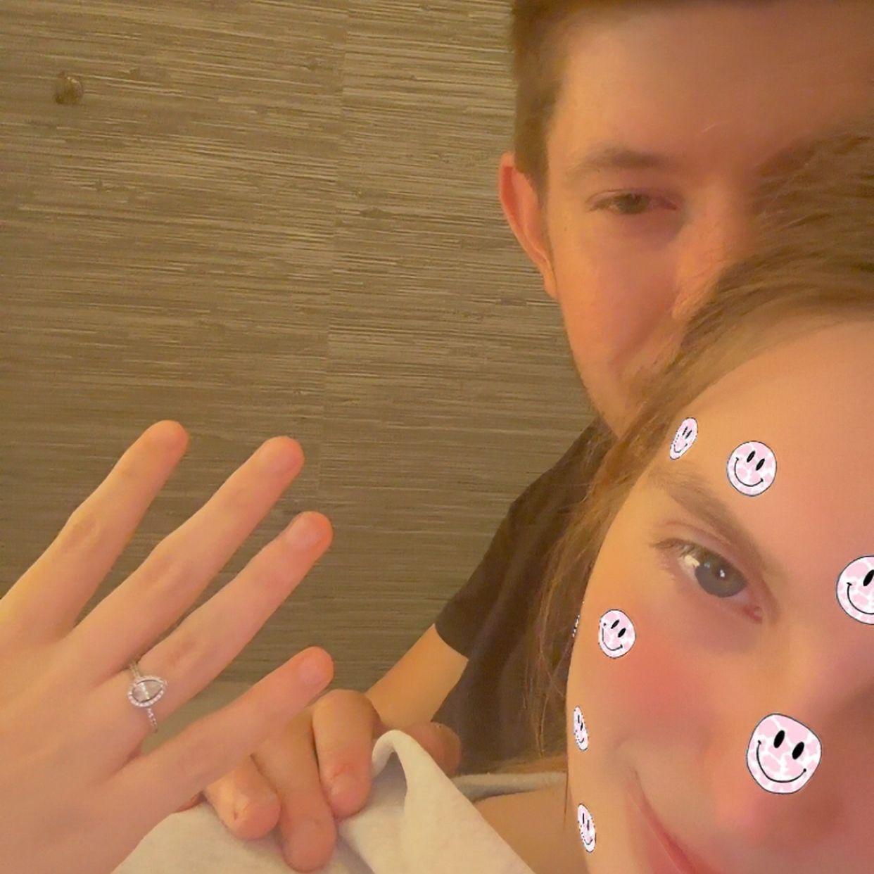 Sitting at home posing with the ring we're still very much exited