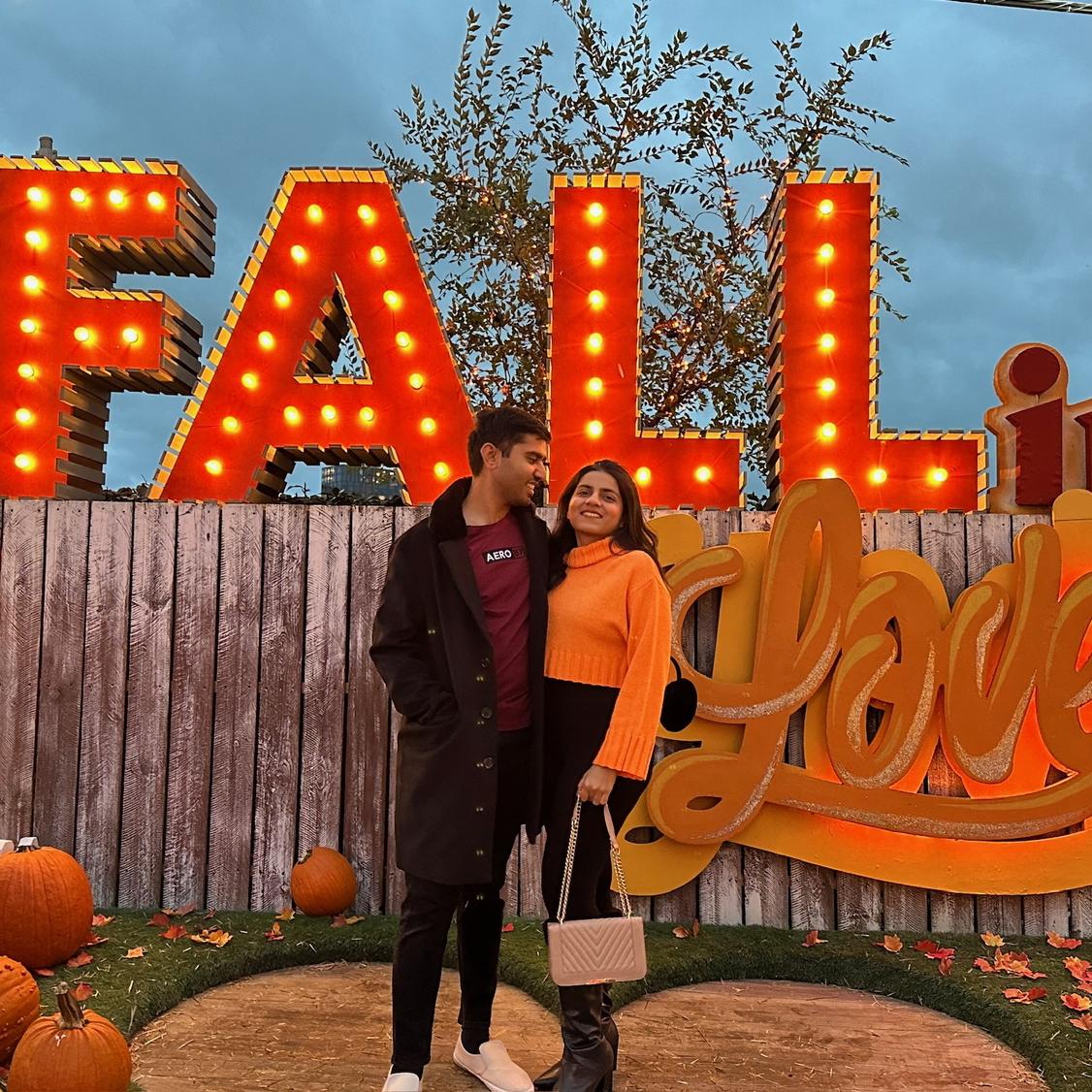 Embracing autumn's charm together at our first Pumpkin Fest! 🎃🍁 #FallInLove #FallingForYou