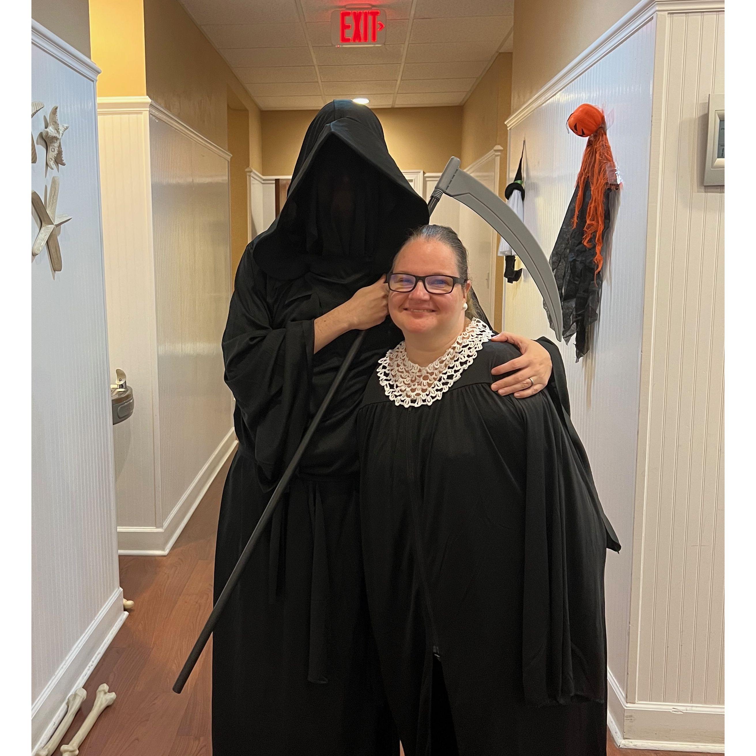 Halloween 2022 where Olivia dressed as Ruth Bader Ginsburg and Zac as the grim reaper behind her.