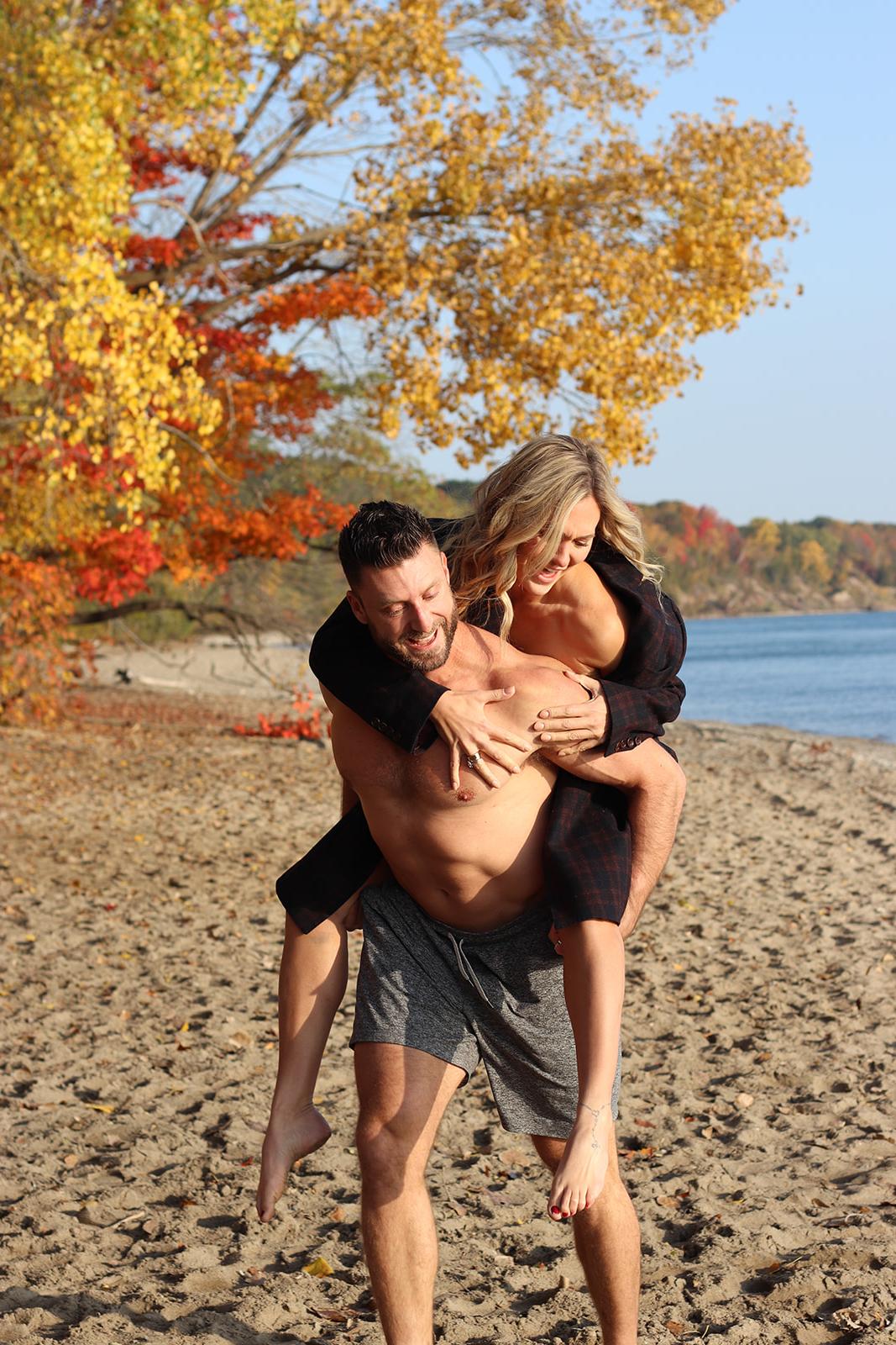 Chivalry is not dead! Piggy backin' to avoid her feet freezing during 40 degree temps at Lake Michigan for our calendar photo shoot!