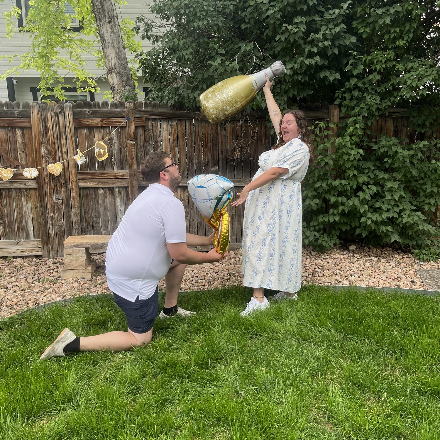 being silly, celebrating our engagement with friends and family at Brandon's childhood home
