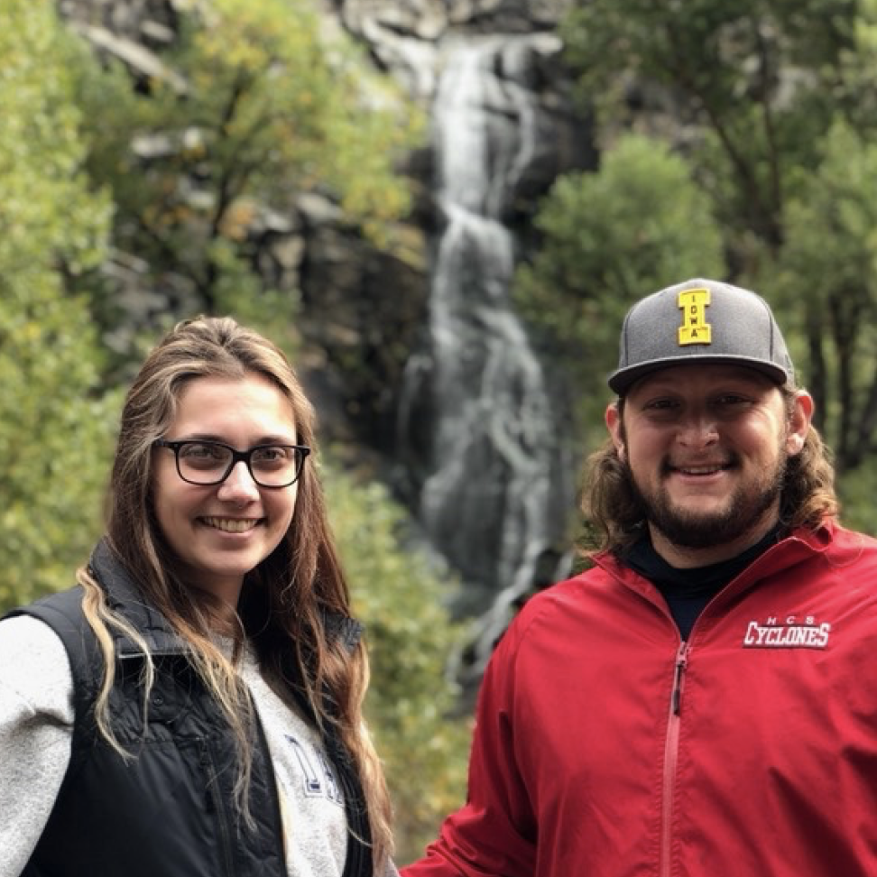 Visiting waterfalls on our first vacation together.