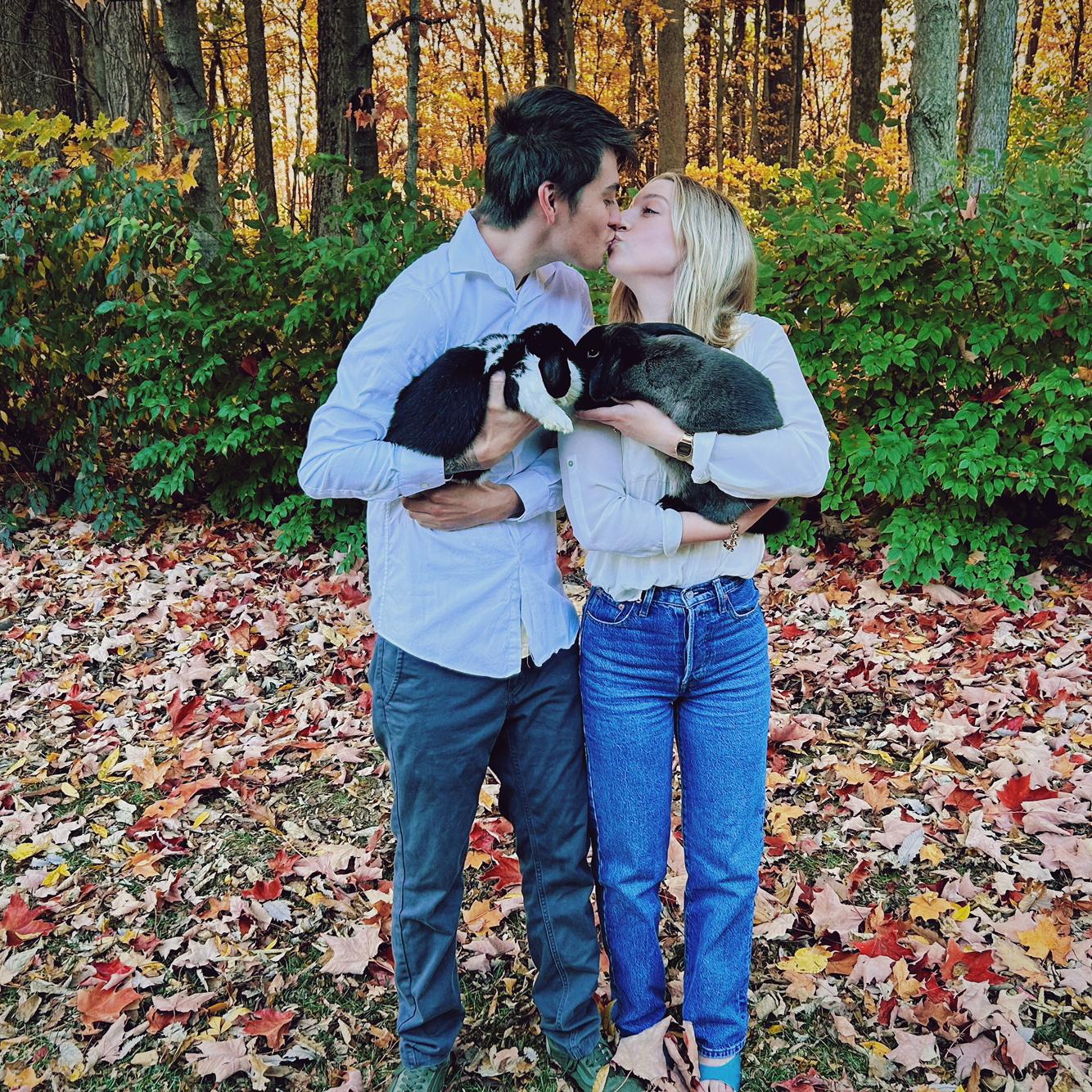 First Family Photo. Olivia is holding Koda--our newest rescue--and Anthony is holding Zenki.
