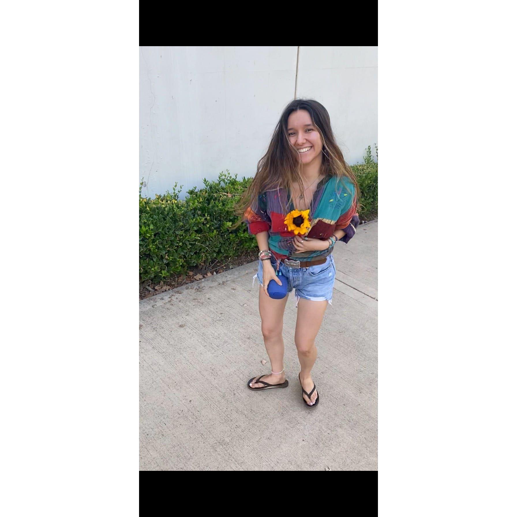 We toured UCR on our second 'hang-out'. Her's "Breathing Easy" played from Sebastwo, Genesis' speaker, tied to her belt. Michael's sunflower bounced from her shirt. We said "I love you" that night. <3