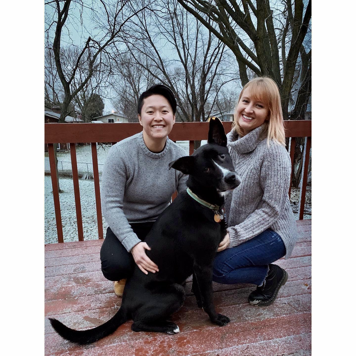 Picture description: Ashley, Anhthu and Mars are on a back porch & snow is on the ground.