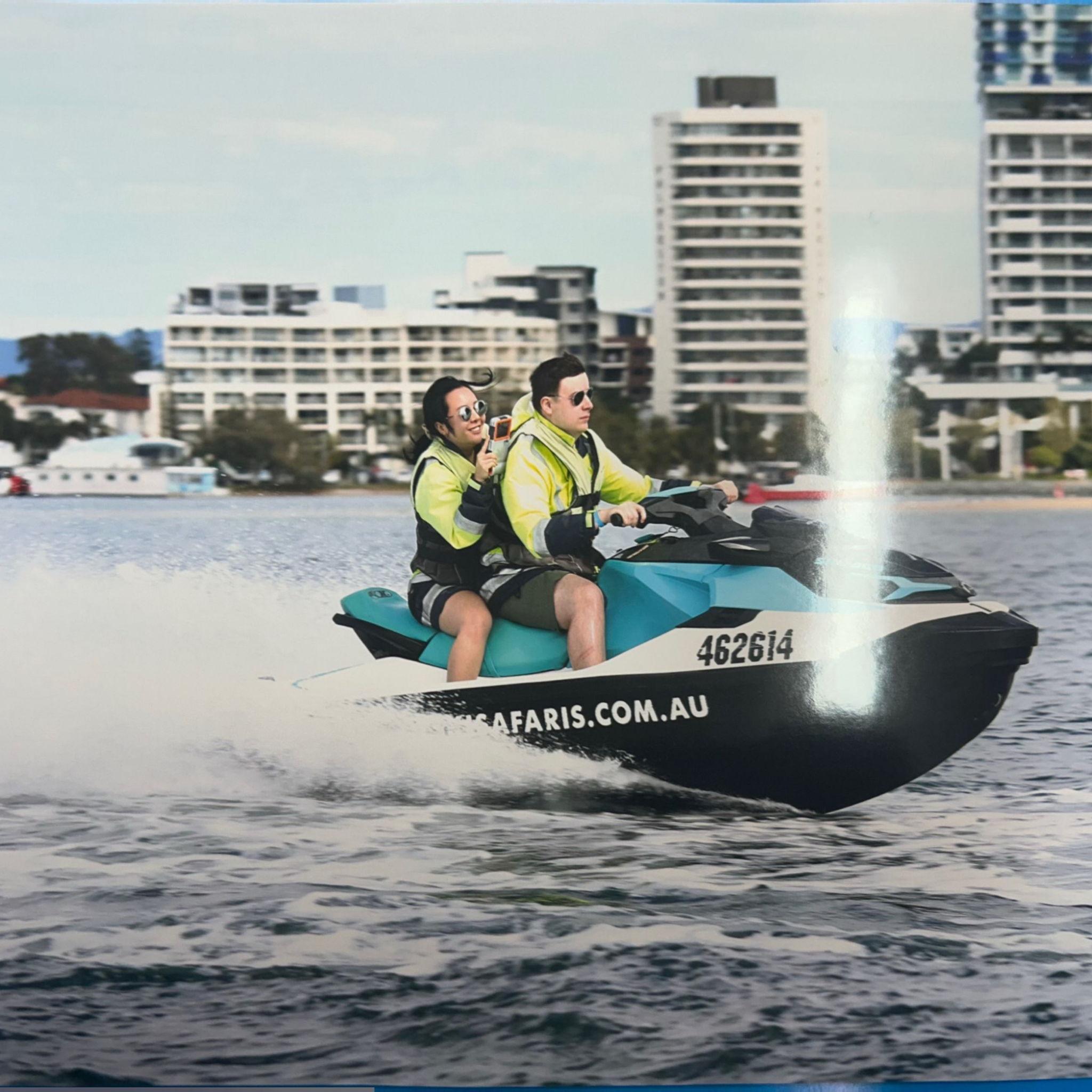 June 2025, Gold Coast, Australia - Oh my word, is that James Bond on that jet ski with his leading lady?! No doubt gallantly escaping after successfully executing another daring mission.