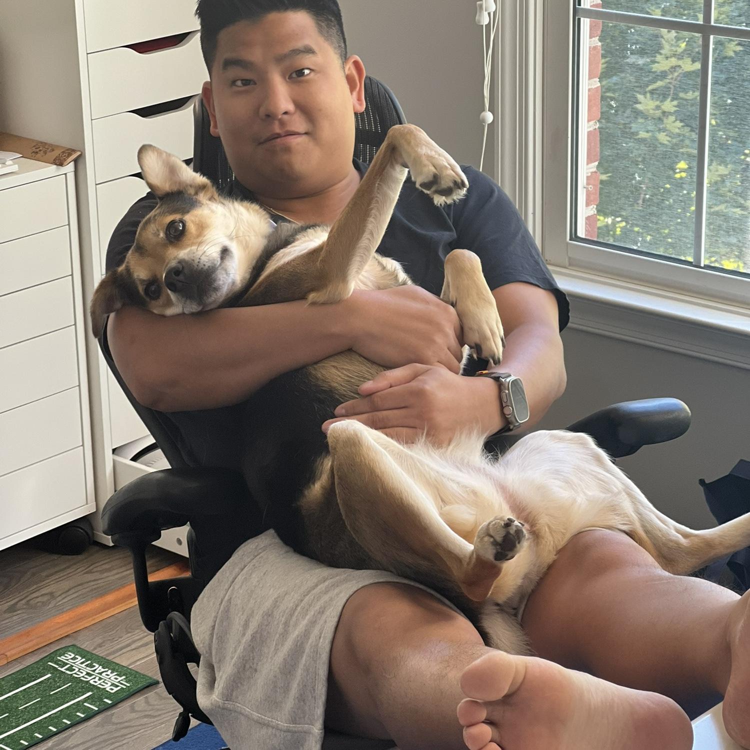 Rosie loves having two humans to wait on her every whim