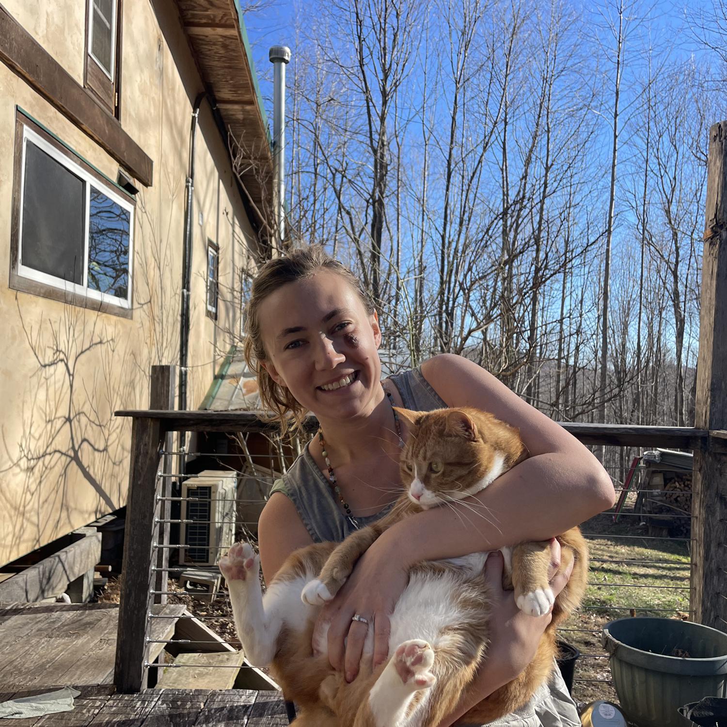 Morgan and KittyMan (RIP) on our porch soaking up some winter sun.
