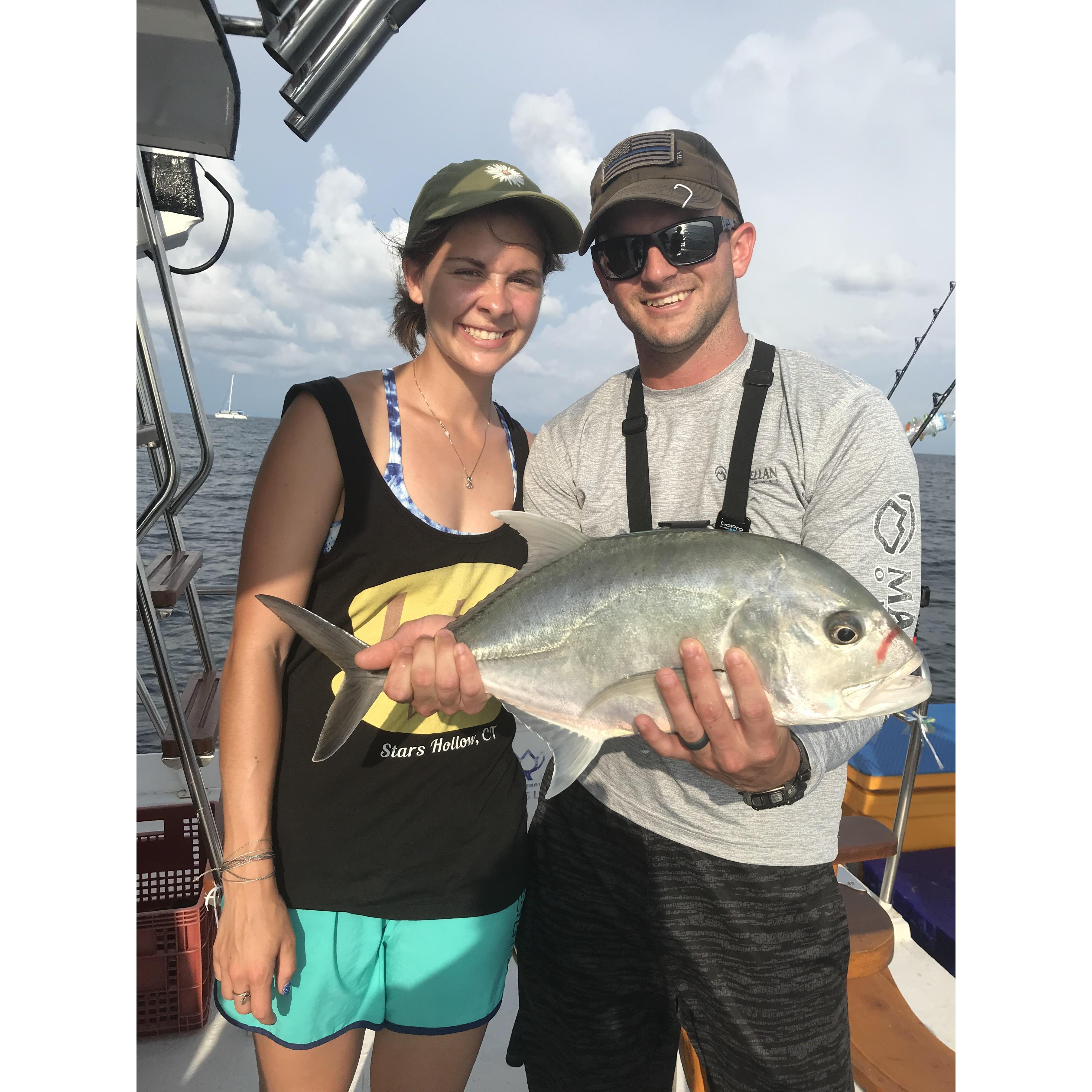 She landed it! Baby Giant Trevally.