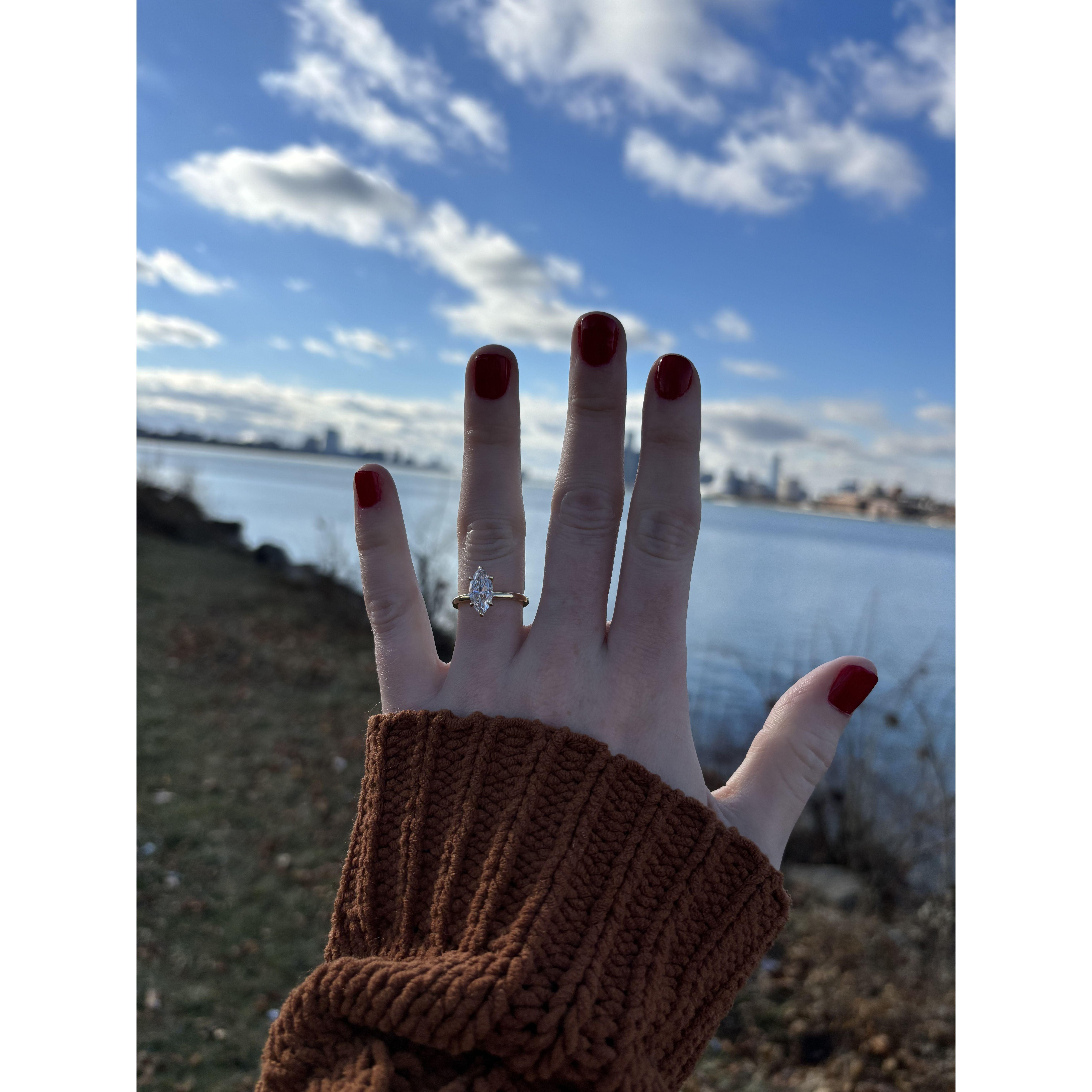 Taken at Belle Isle right after Gary proposed. One side of the river is Detroit (right), the other side is Canada (left).