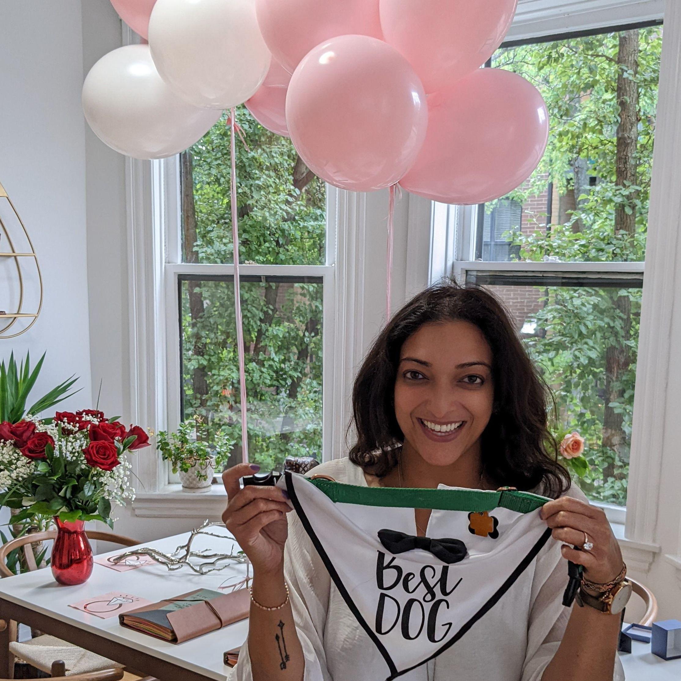 Appi was overjoyed after returning home to see congratulatory balloons, ornaments, table settings, a bouquet of flowers and a special scarf for Enzo as tokens to celebrate our engagement!