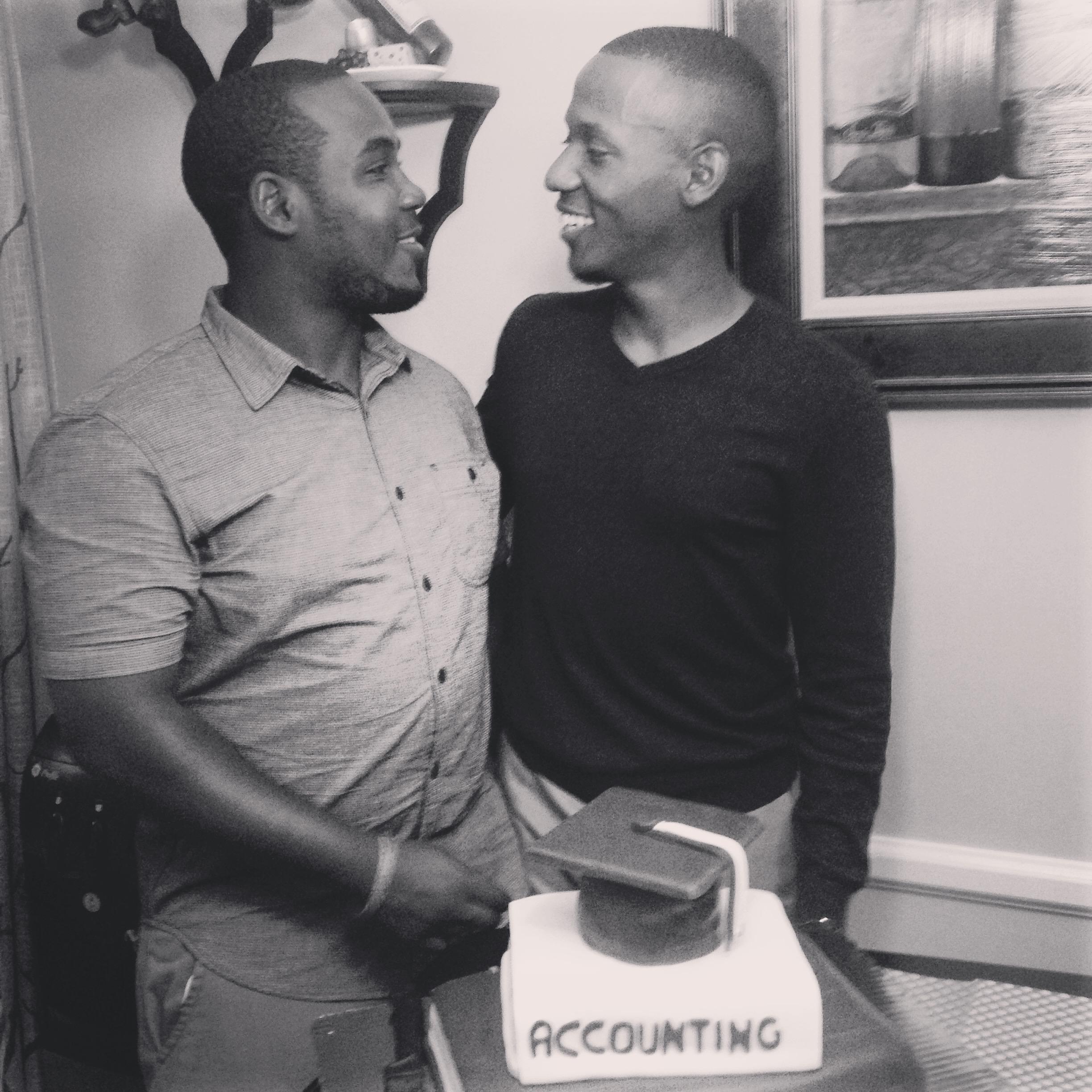 Ernest and Didi (his brother) sizing up each other... Ernest is still taller than him.
