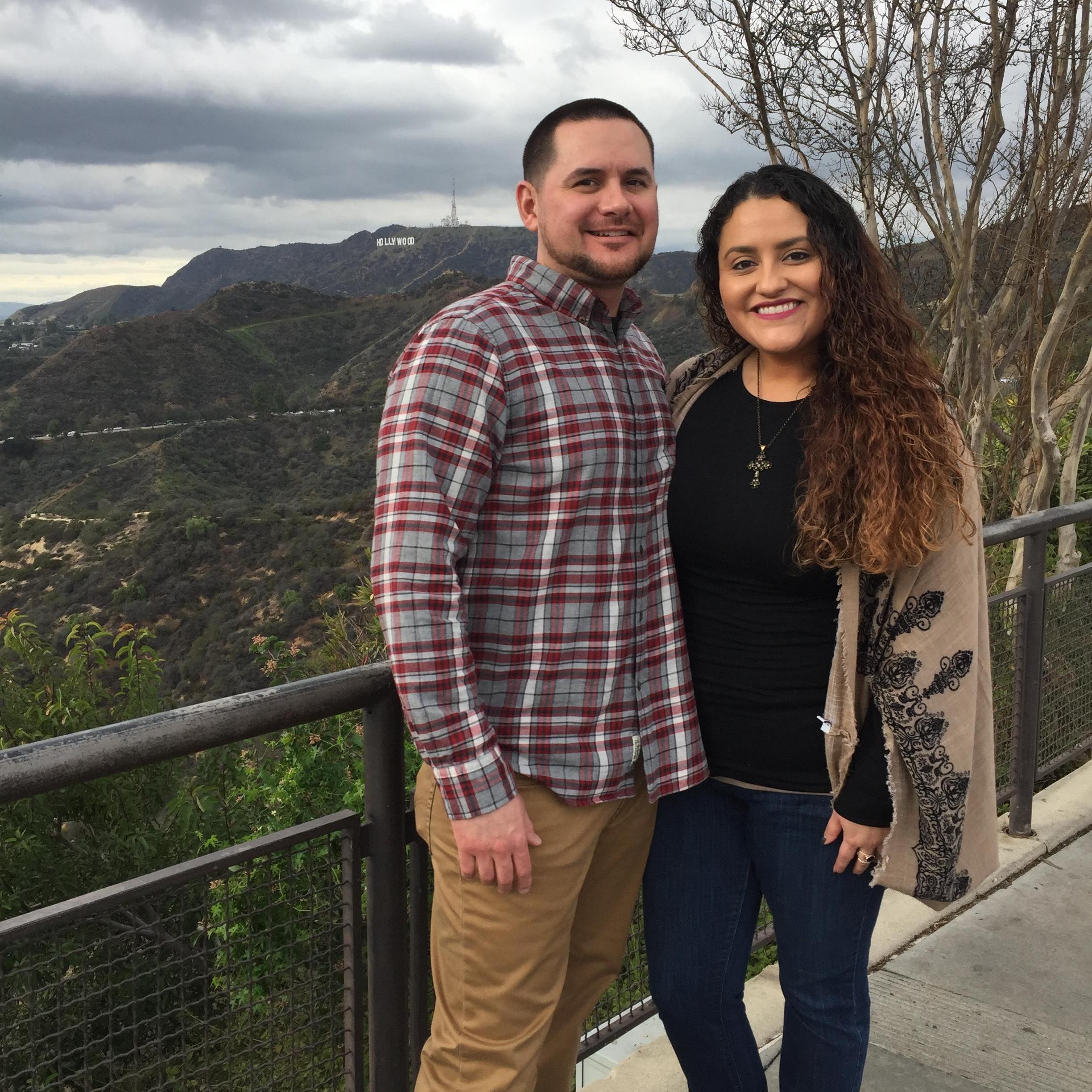 At the Griffith Observatory in front of the Hollywood Sign.