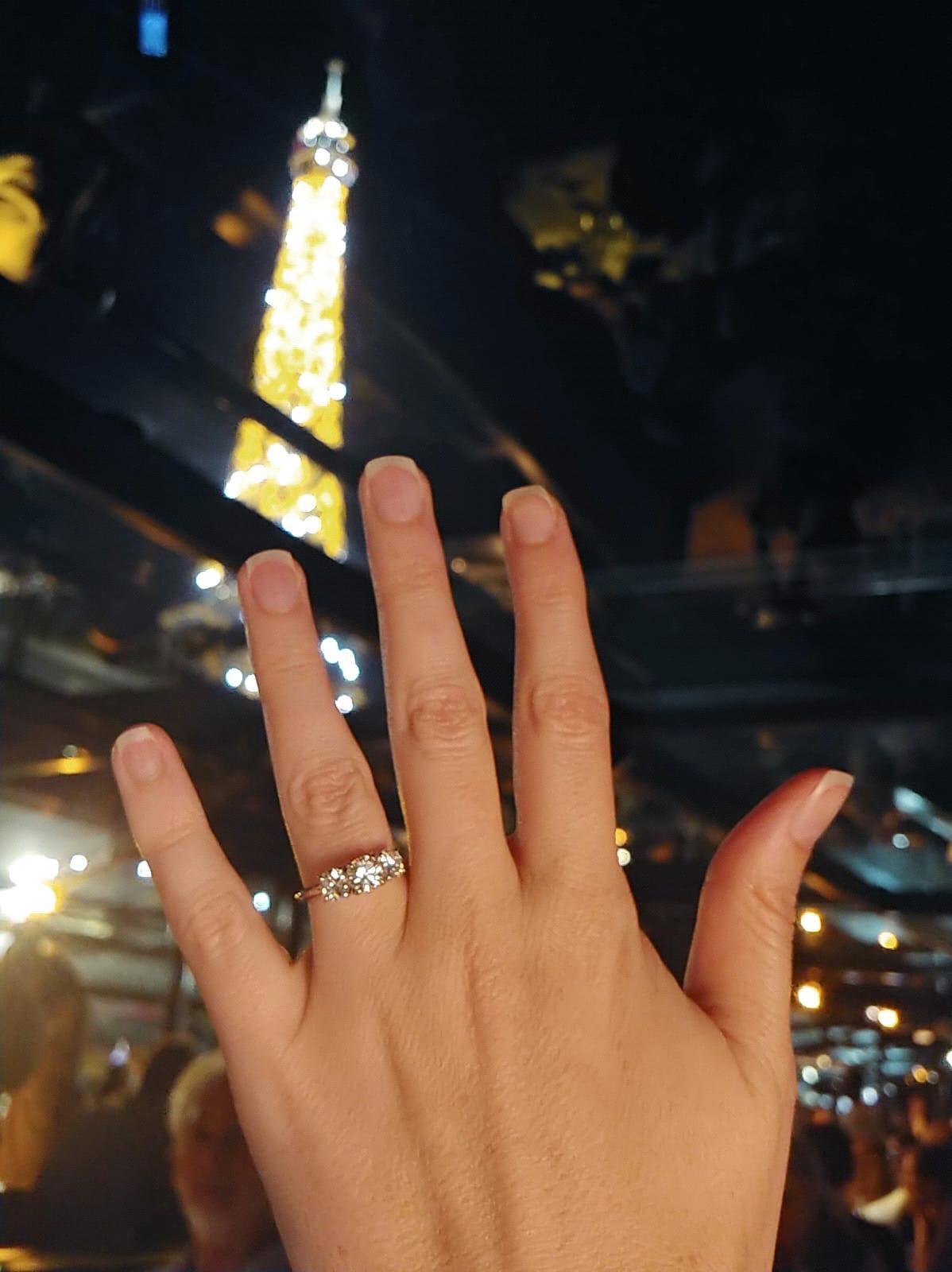 Engaged under the lights of the Eiffel Tower