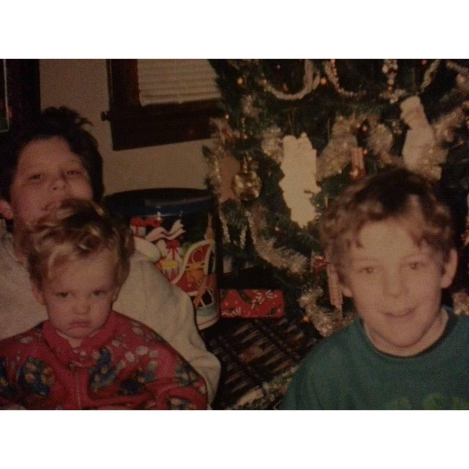 I'd say this photo might be a little more accurate of Bryce as a child! Yes, he is the grumpy little one in the corner.