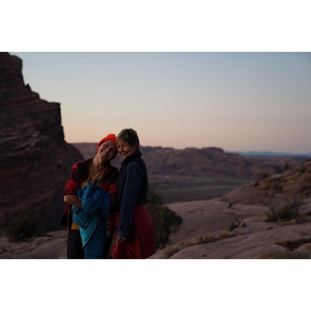 Sunset smiles with mom.