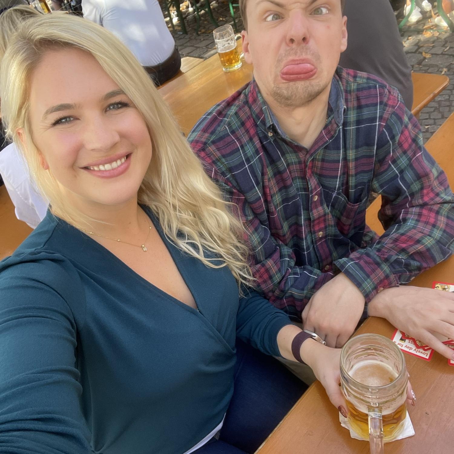 Playing cards and being silly at a beer garden in Munich :).